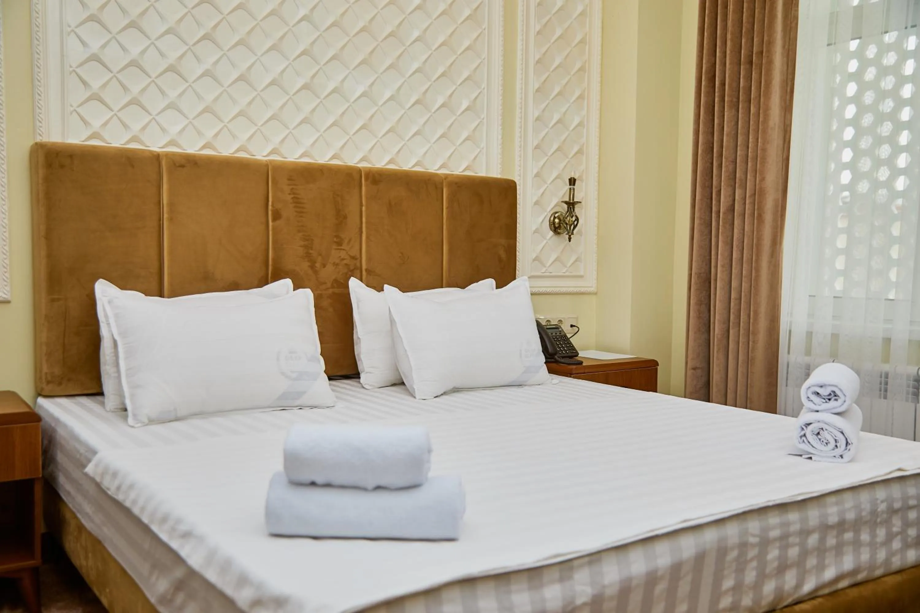 Bed in Sangzor Boutique Hotel