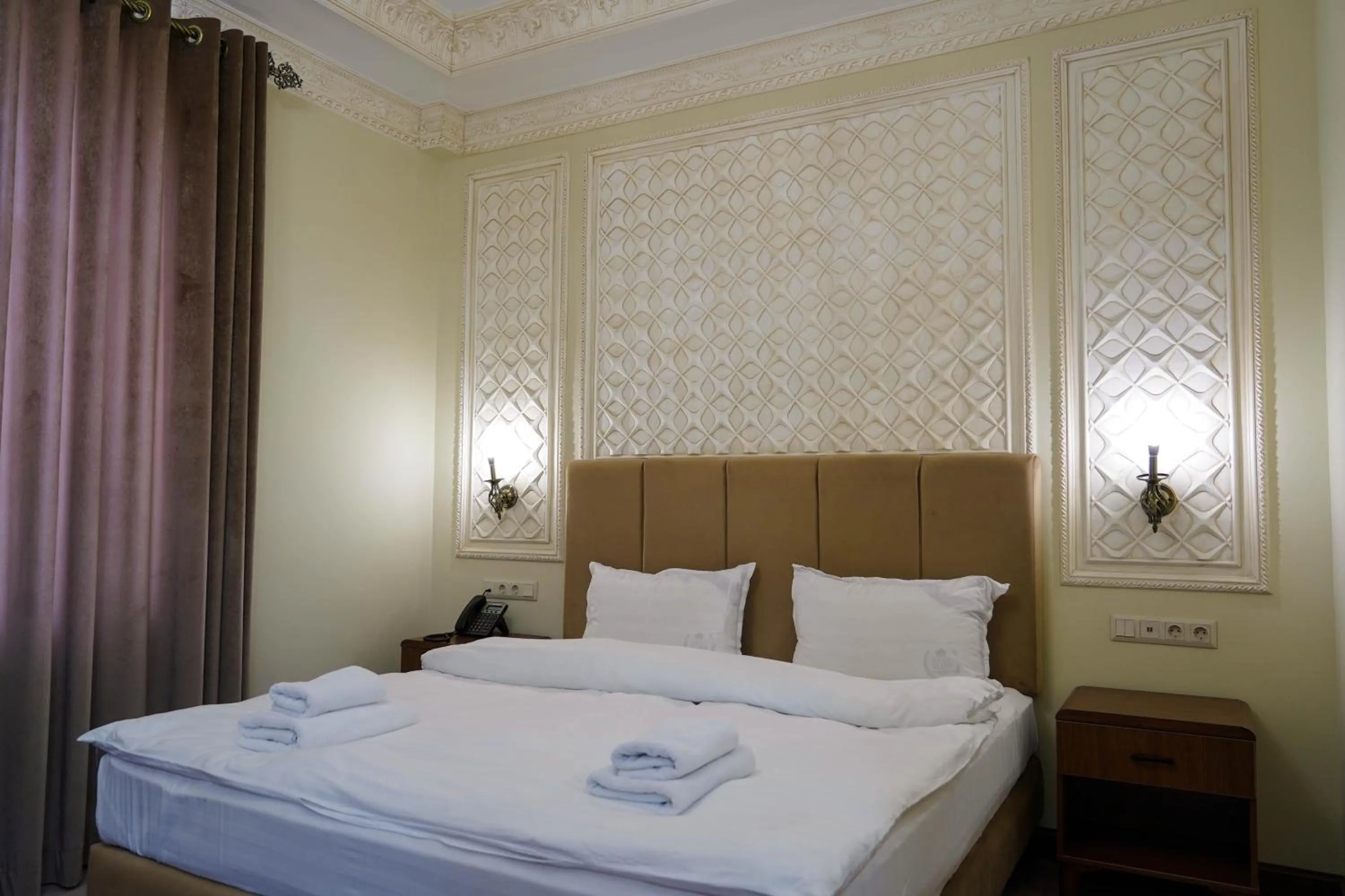 Bed in Sangzor Boutique Hotel