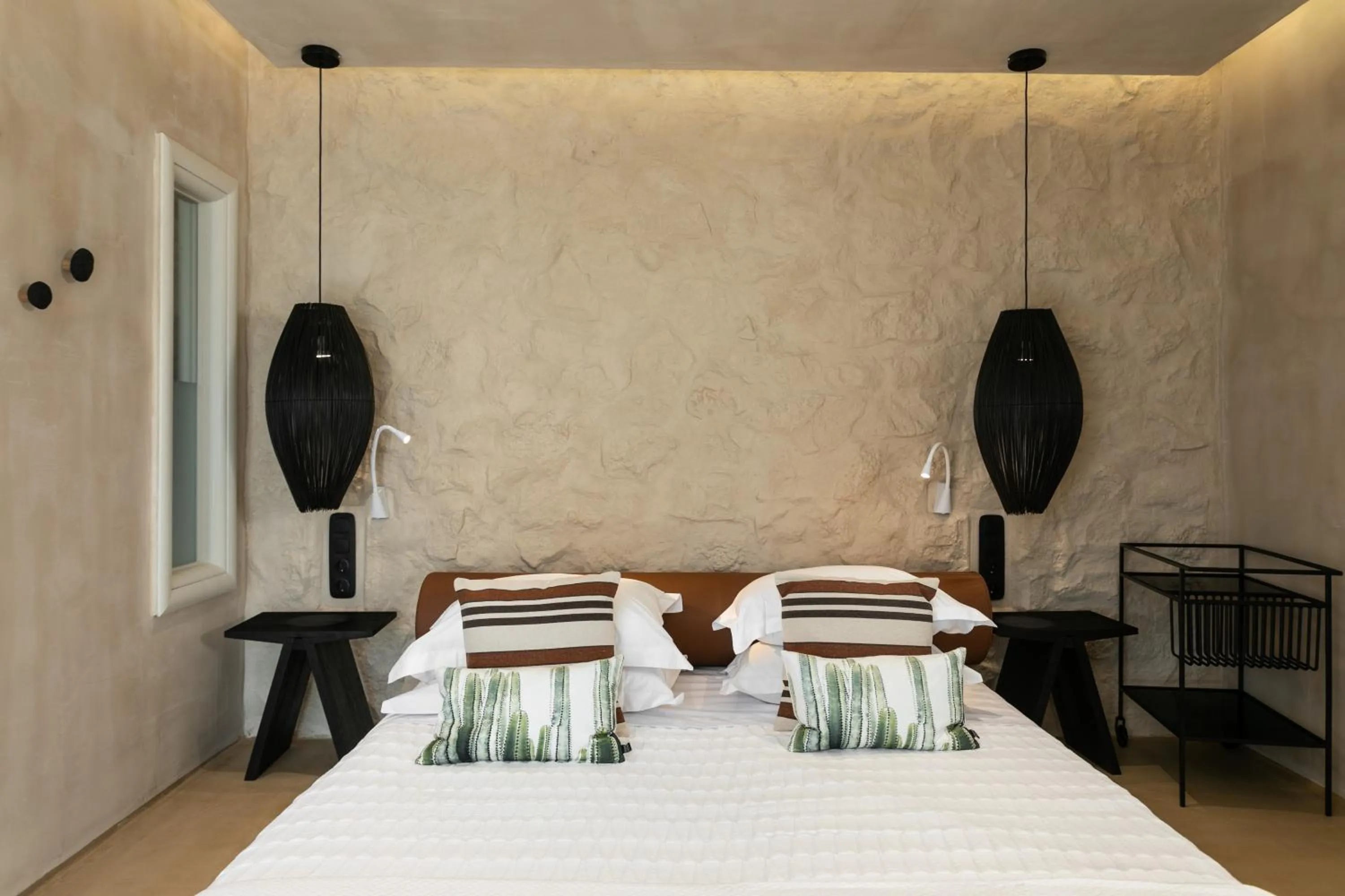 Bed in Eden Beachfront Residences & Suites