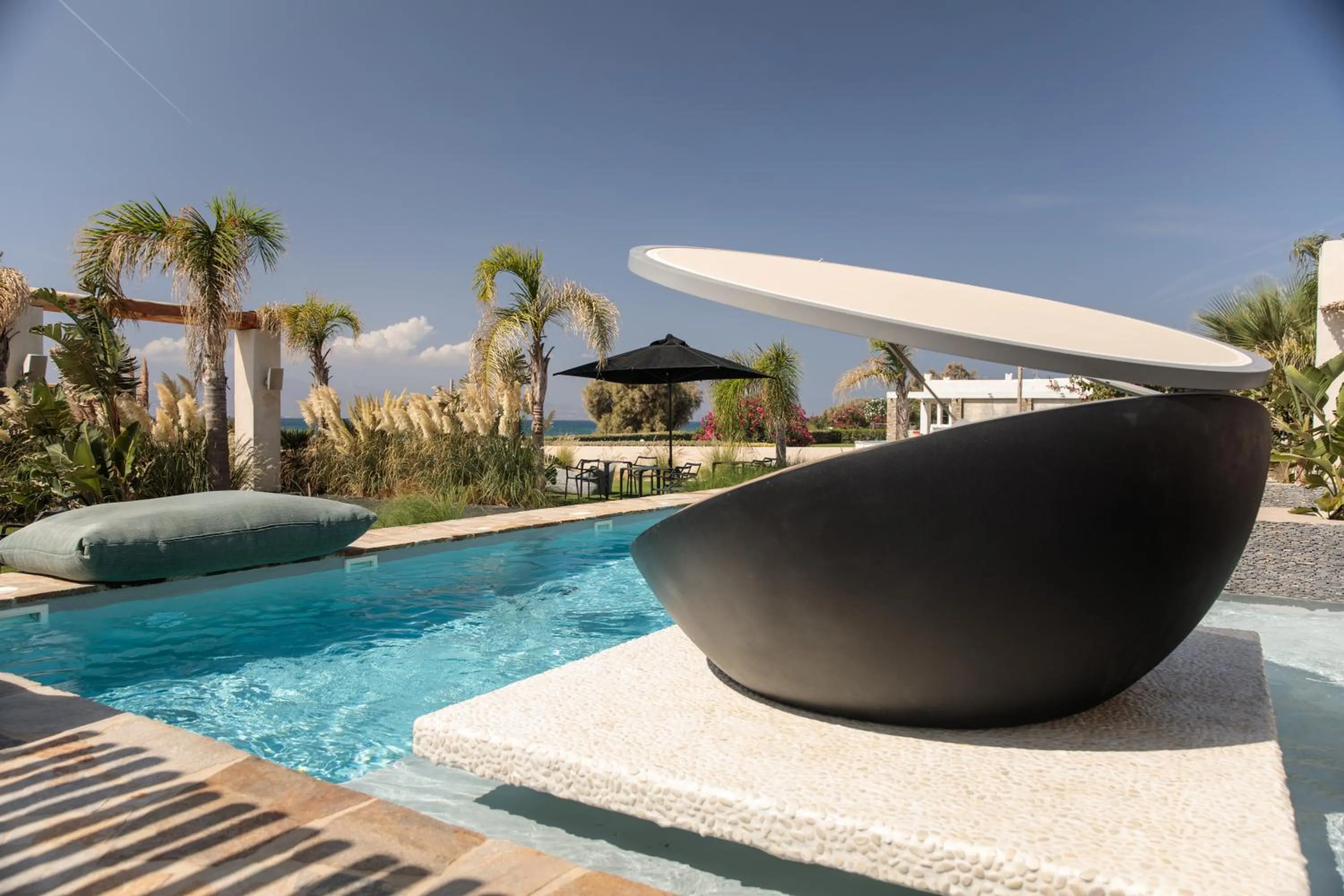 Swimming pool in Eden Beachfront Residences & Suites