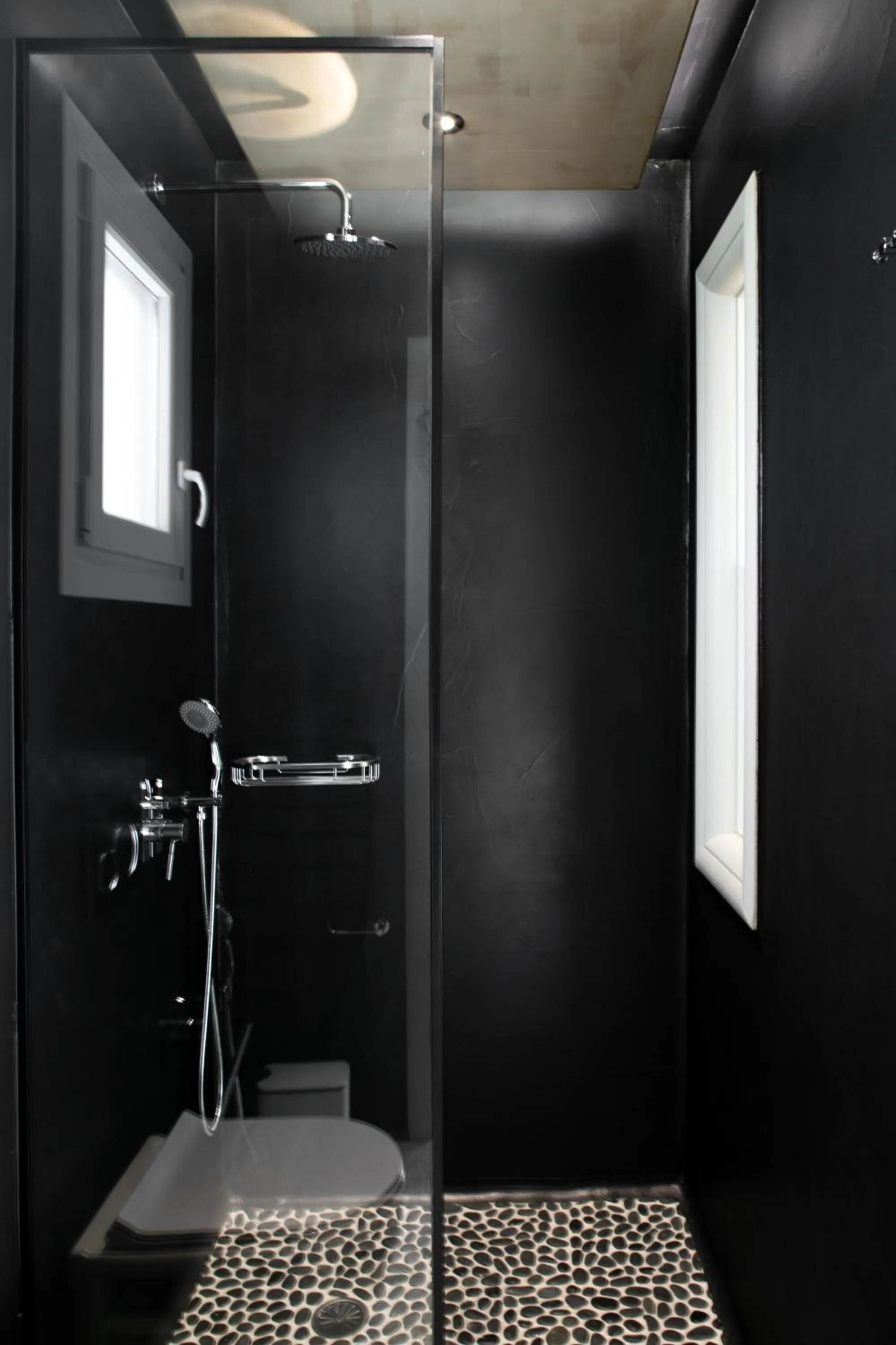 Shower in Eden Beachfront Residences & Suites