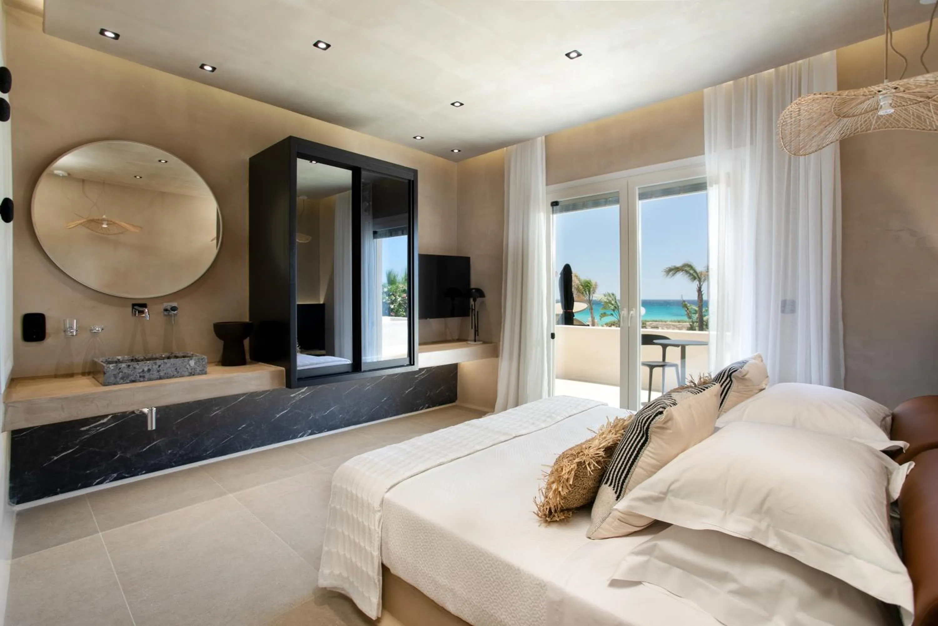 Bed in Eden Beachfront Residences & Suites