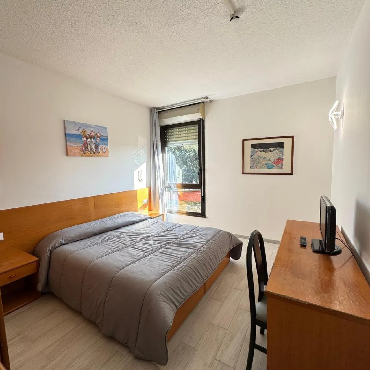 Bed in La Fenice Hotel