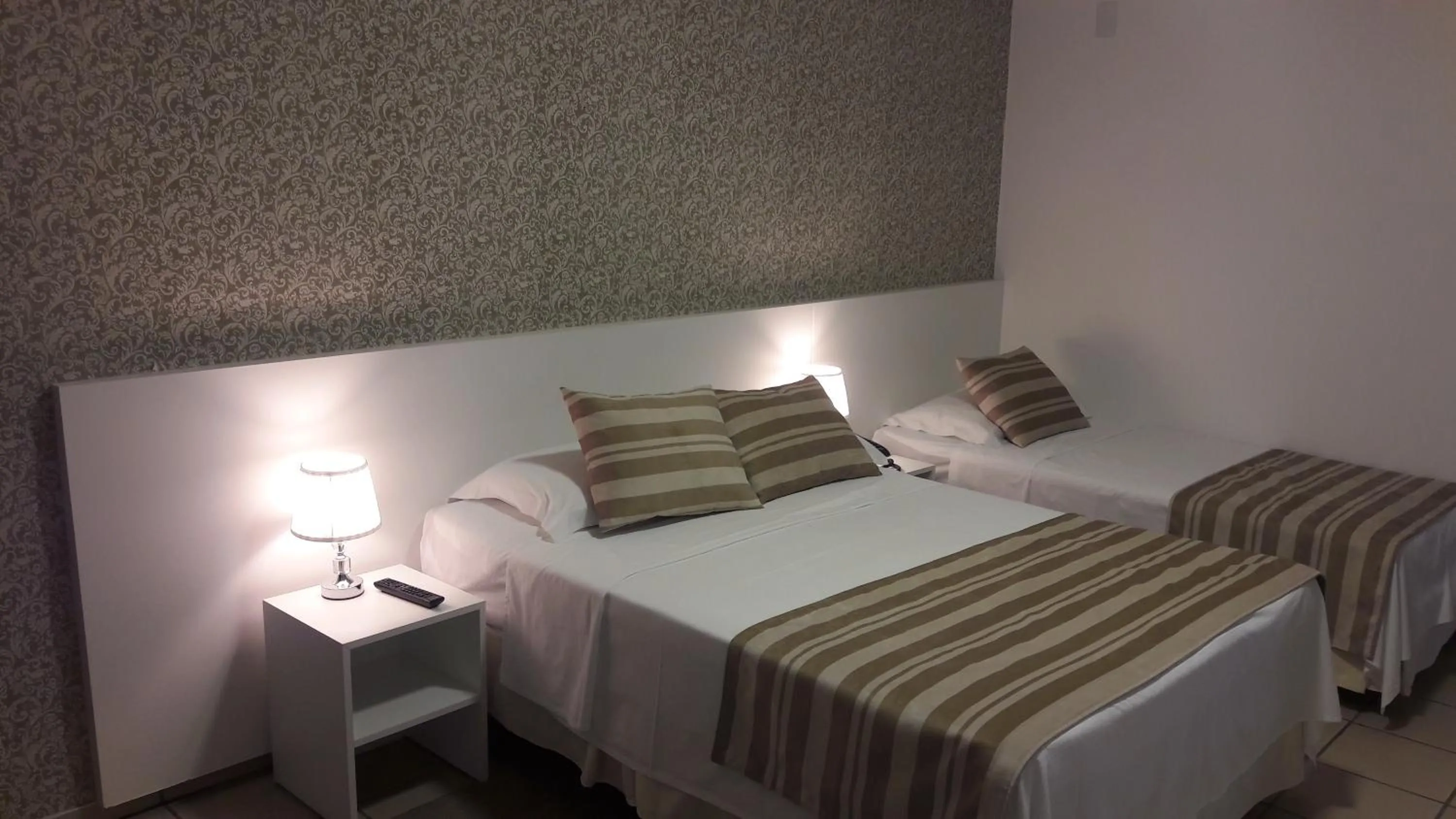 Photo of the whole room, Bed in Hz Hotel