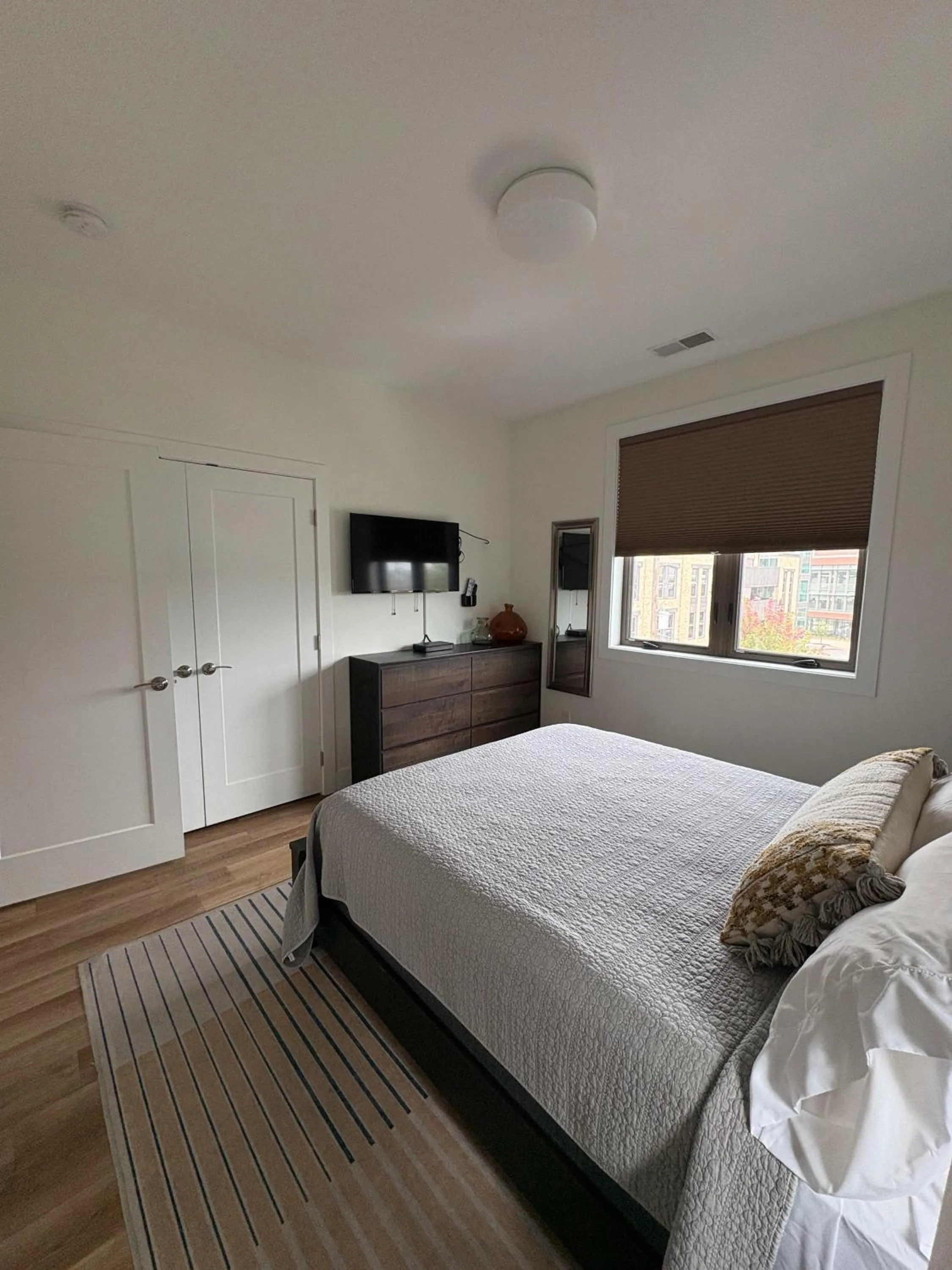 Bed in Downtown Traverse City Capri Condo 316