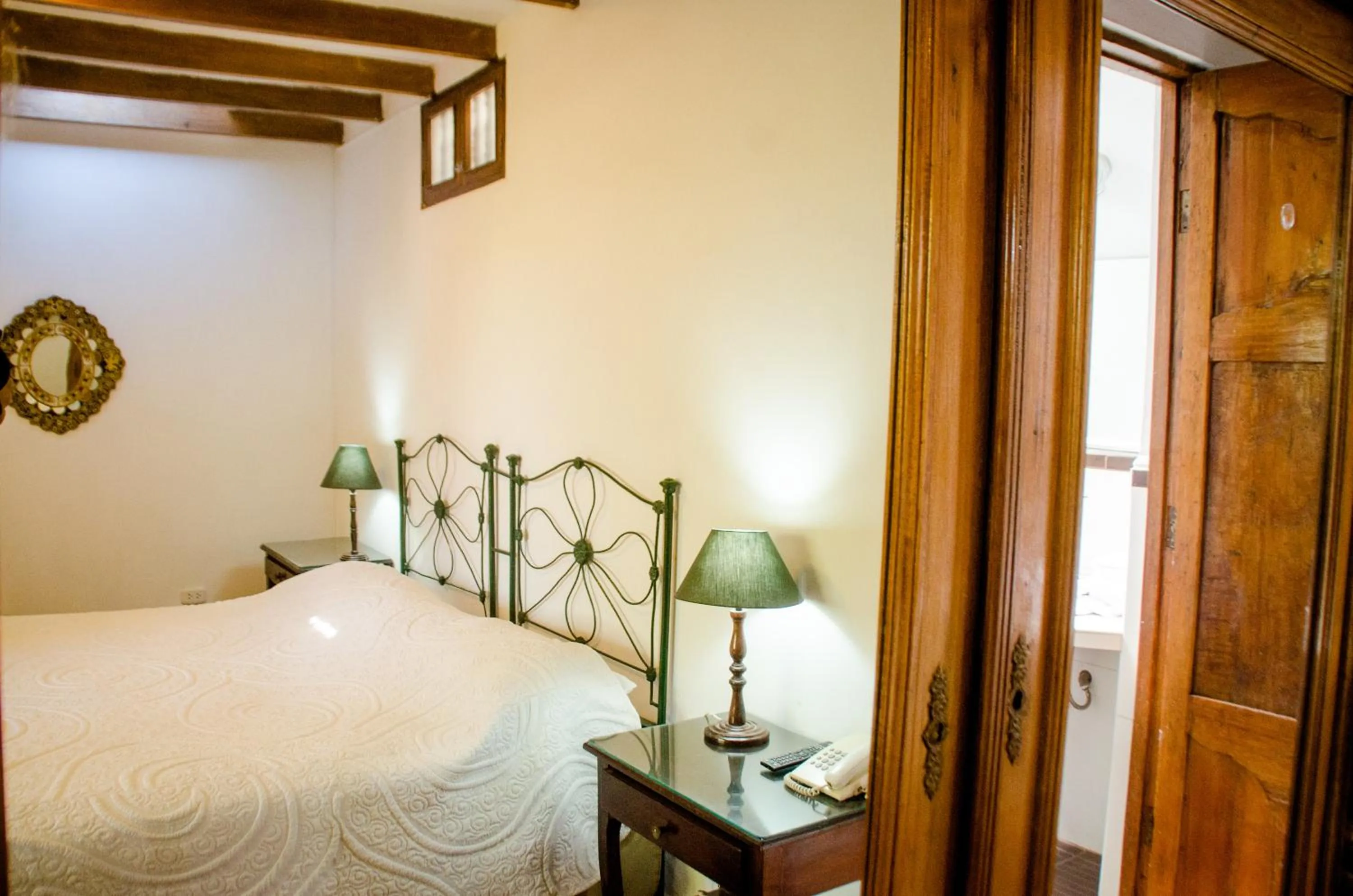 Bed in Hotel & Hacienda El Carmelo