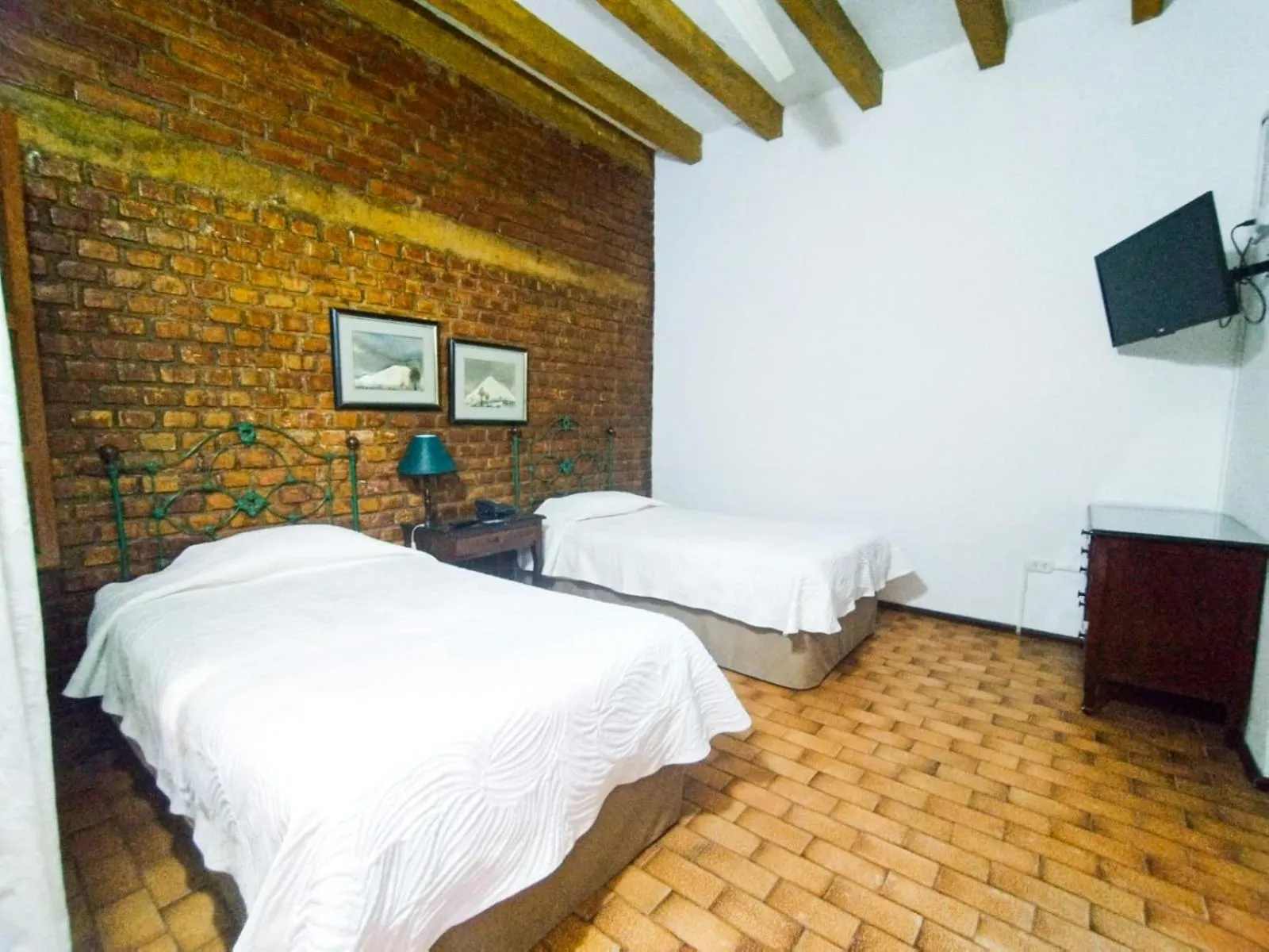 Bed in Hotel & Hacienda El Carmelo