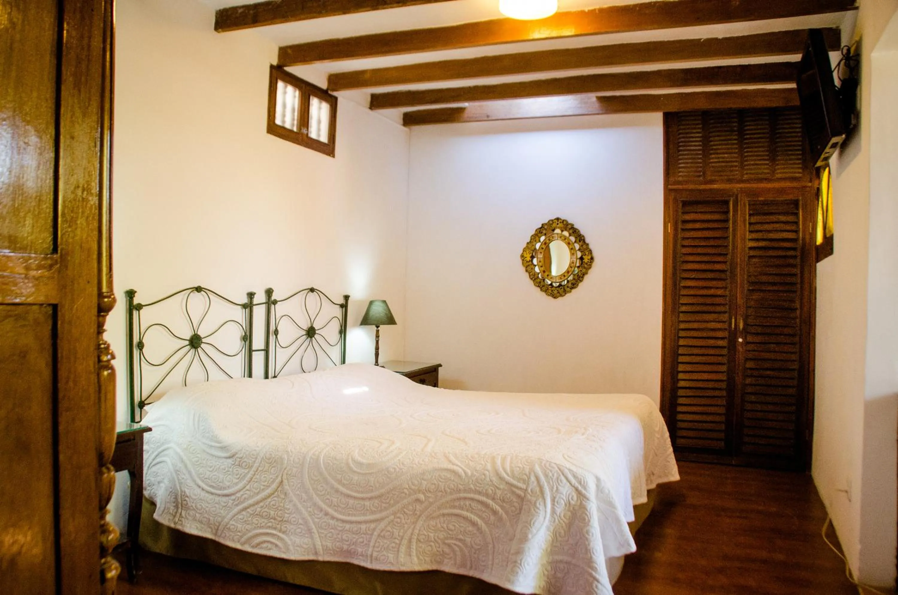 Bed in Hotel & Hacienda El Carmelo