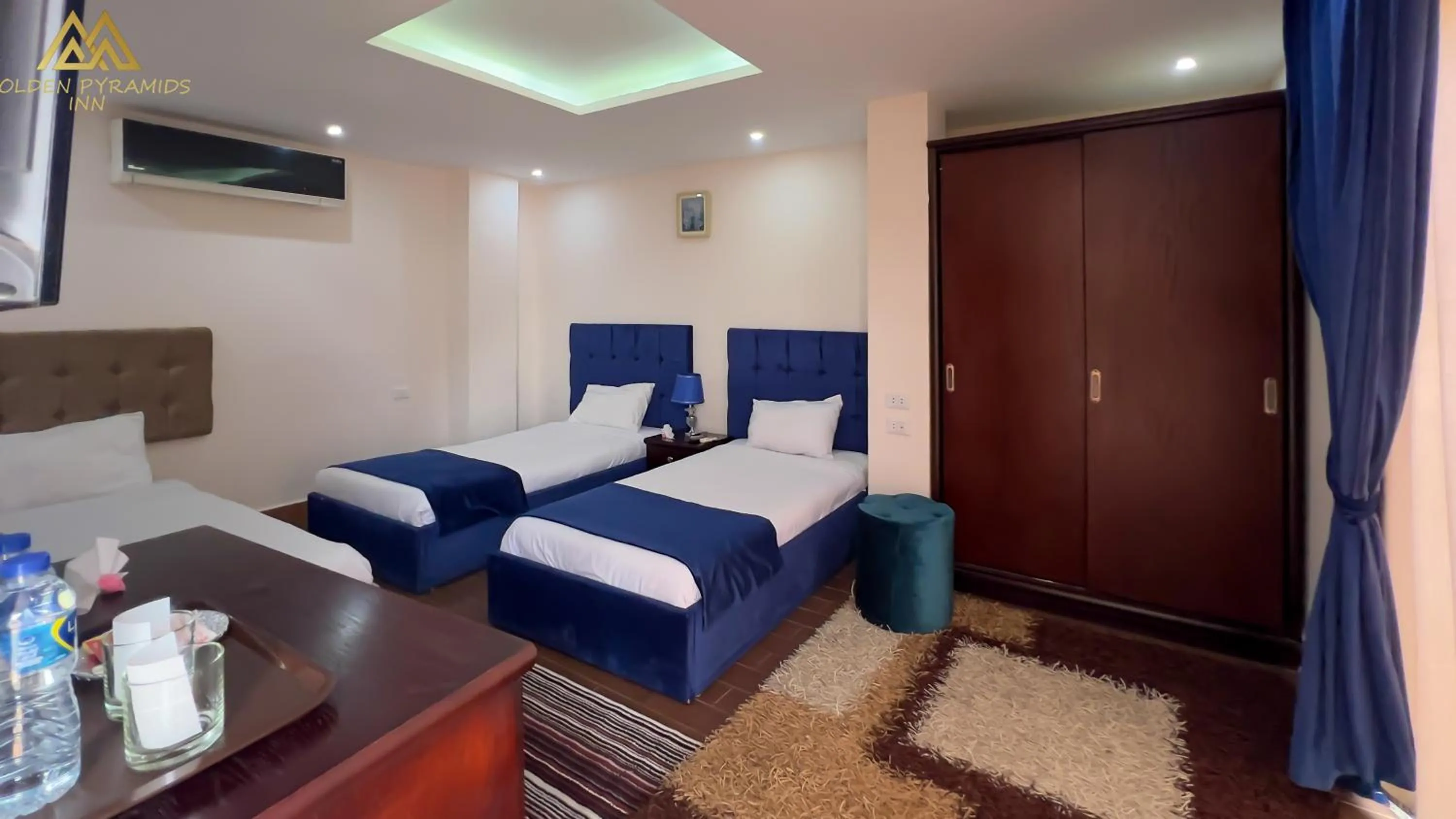 Bed in Golden Pyramids Inn