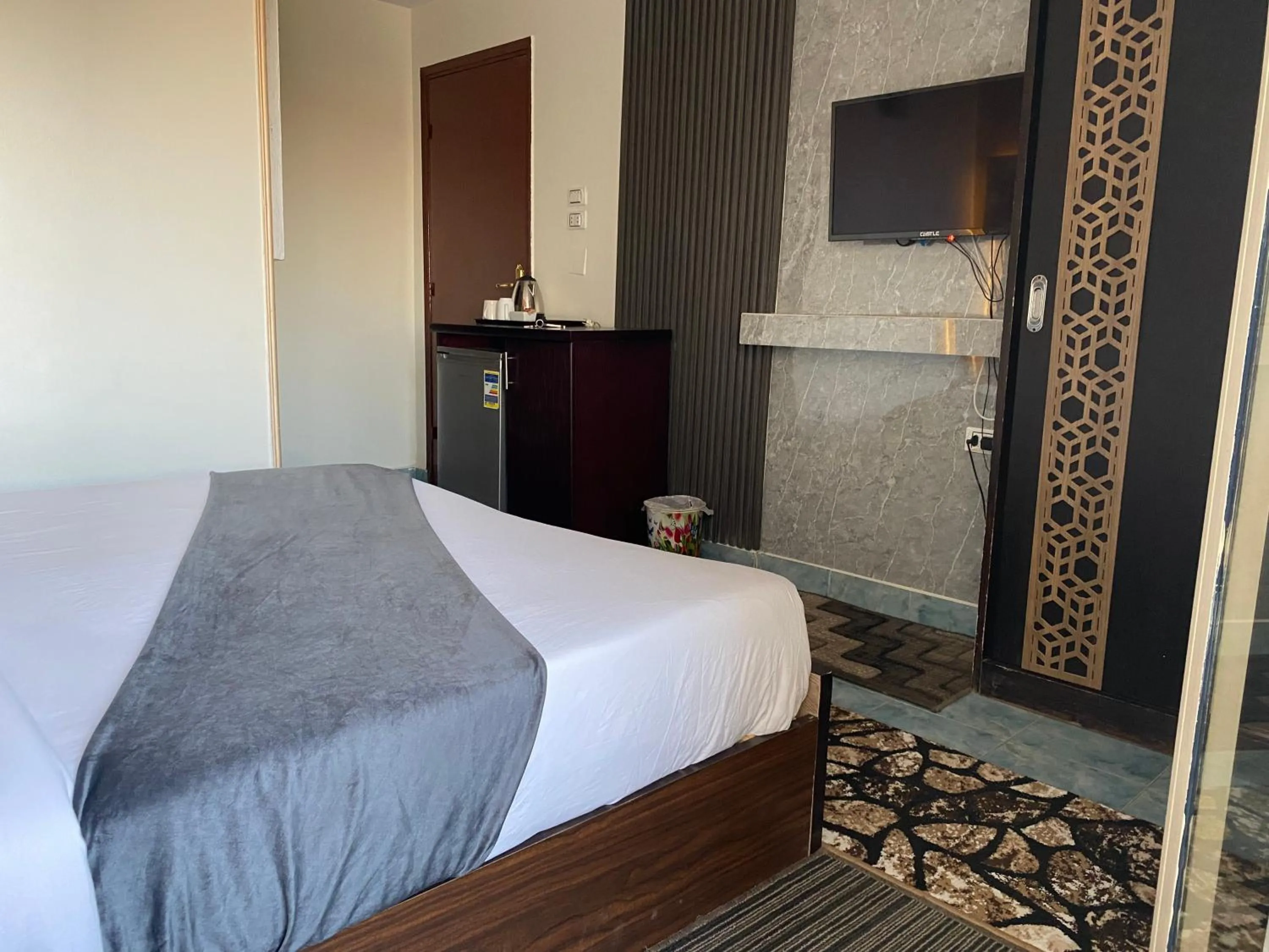 Bed in Golden Pyramids Inn