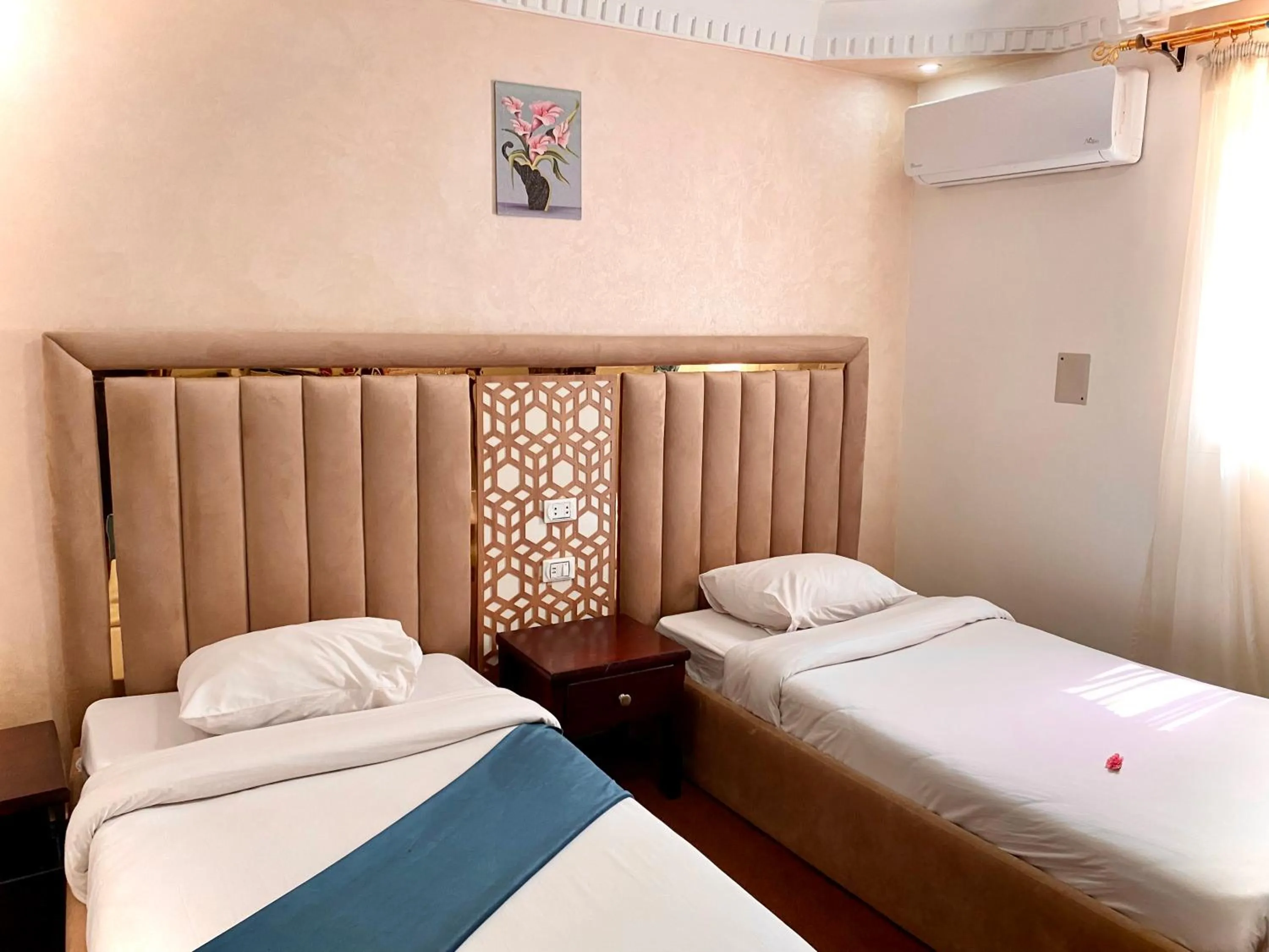 Bed in Golden Pyramids Inn