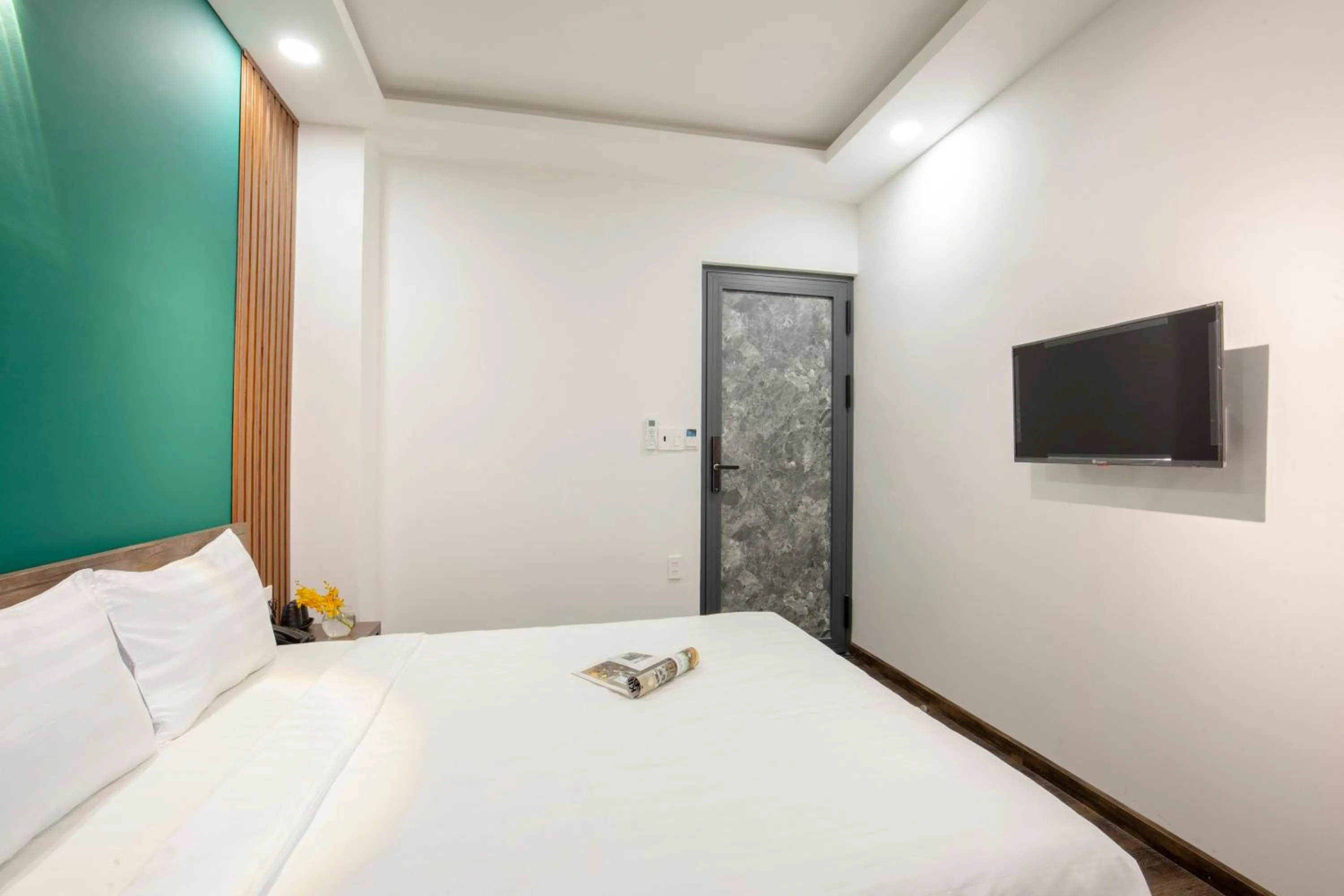 Bed in LÁ HOTEL RIVERSIDE