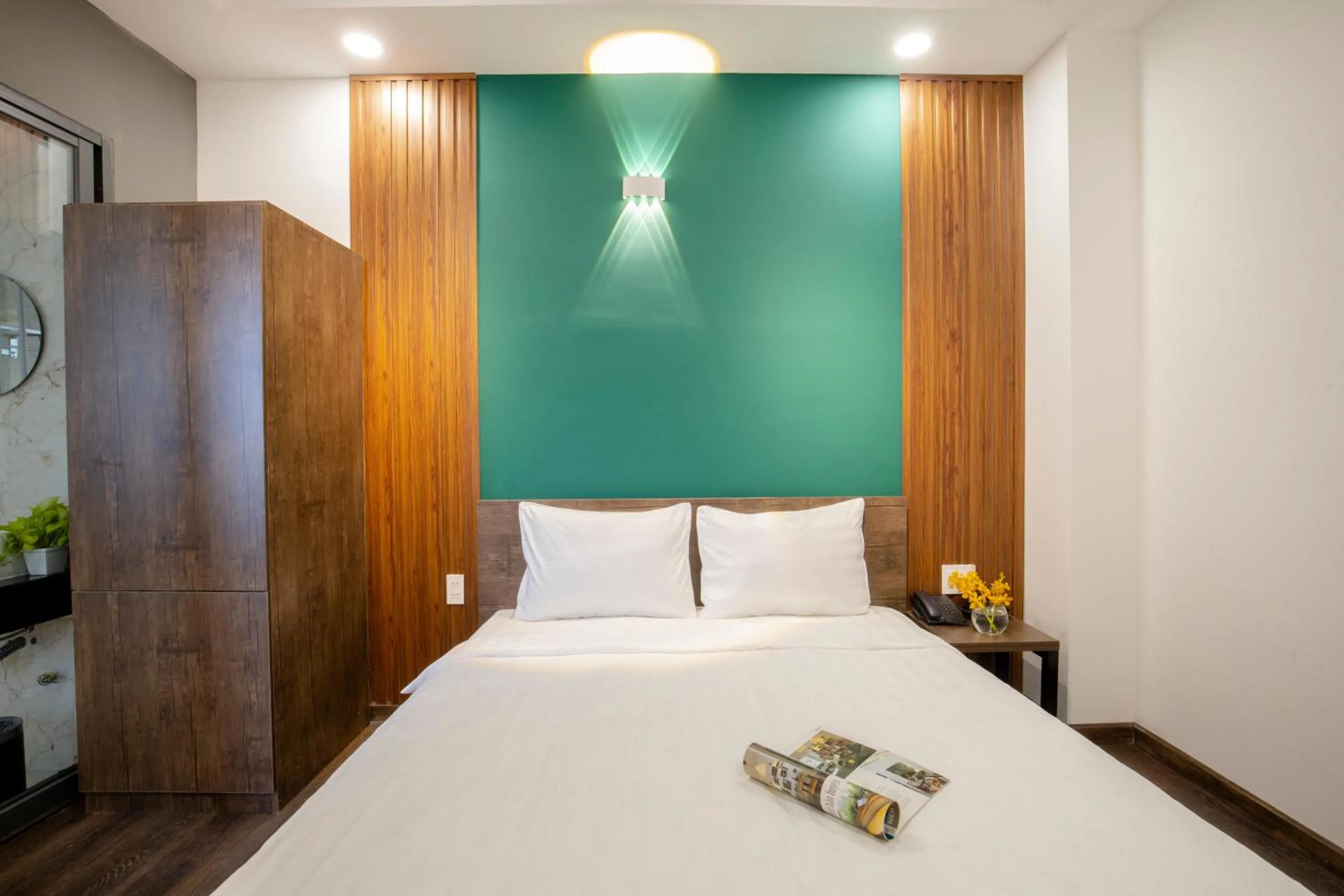 Bed in LÁ HOTEL RIVERSIDE