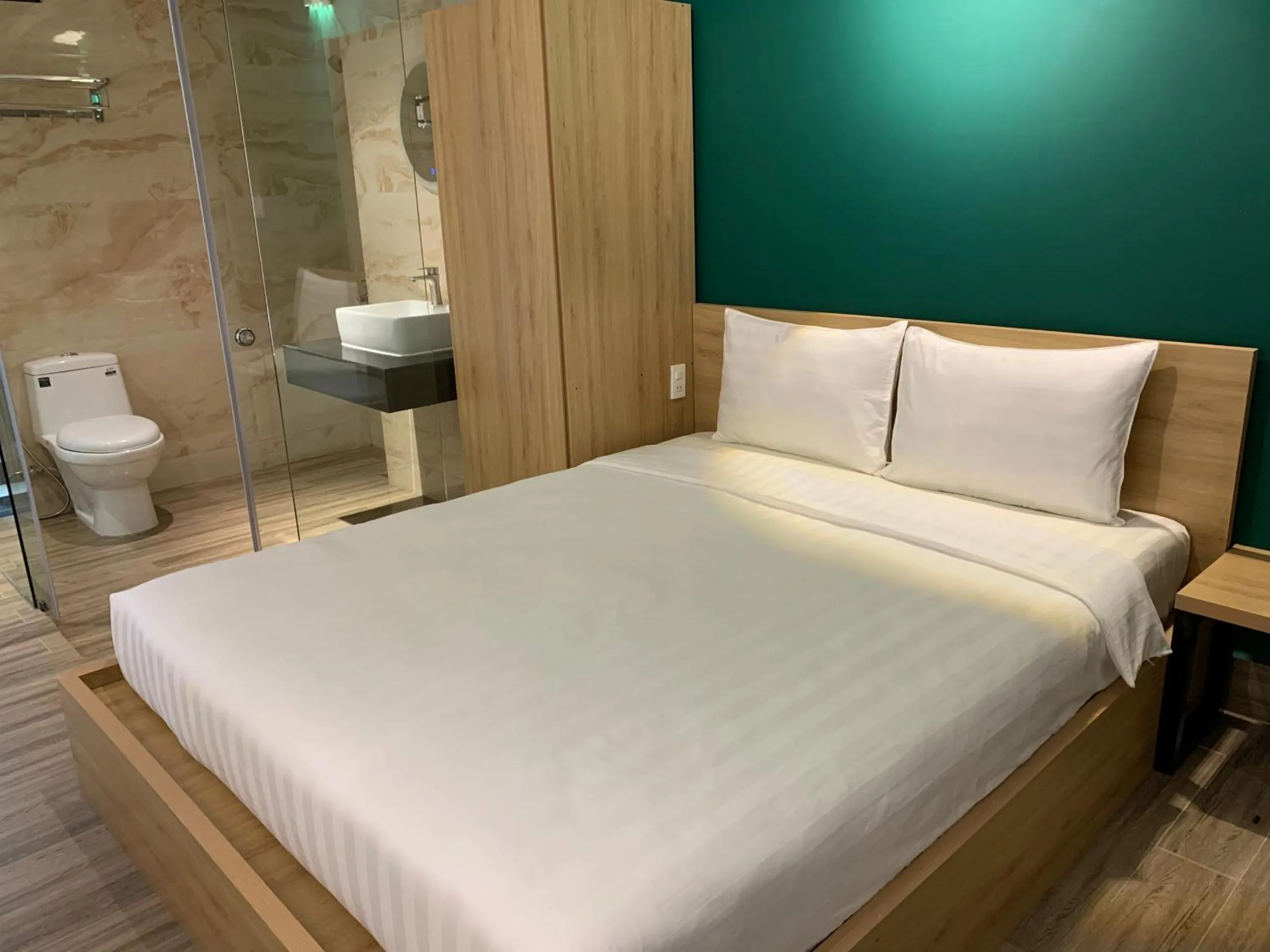 Bed in LÁ HOTEL RIVERSIDE