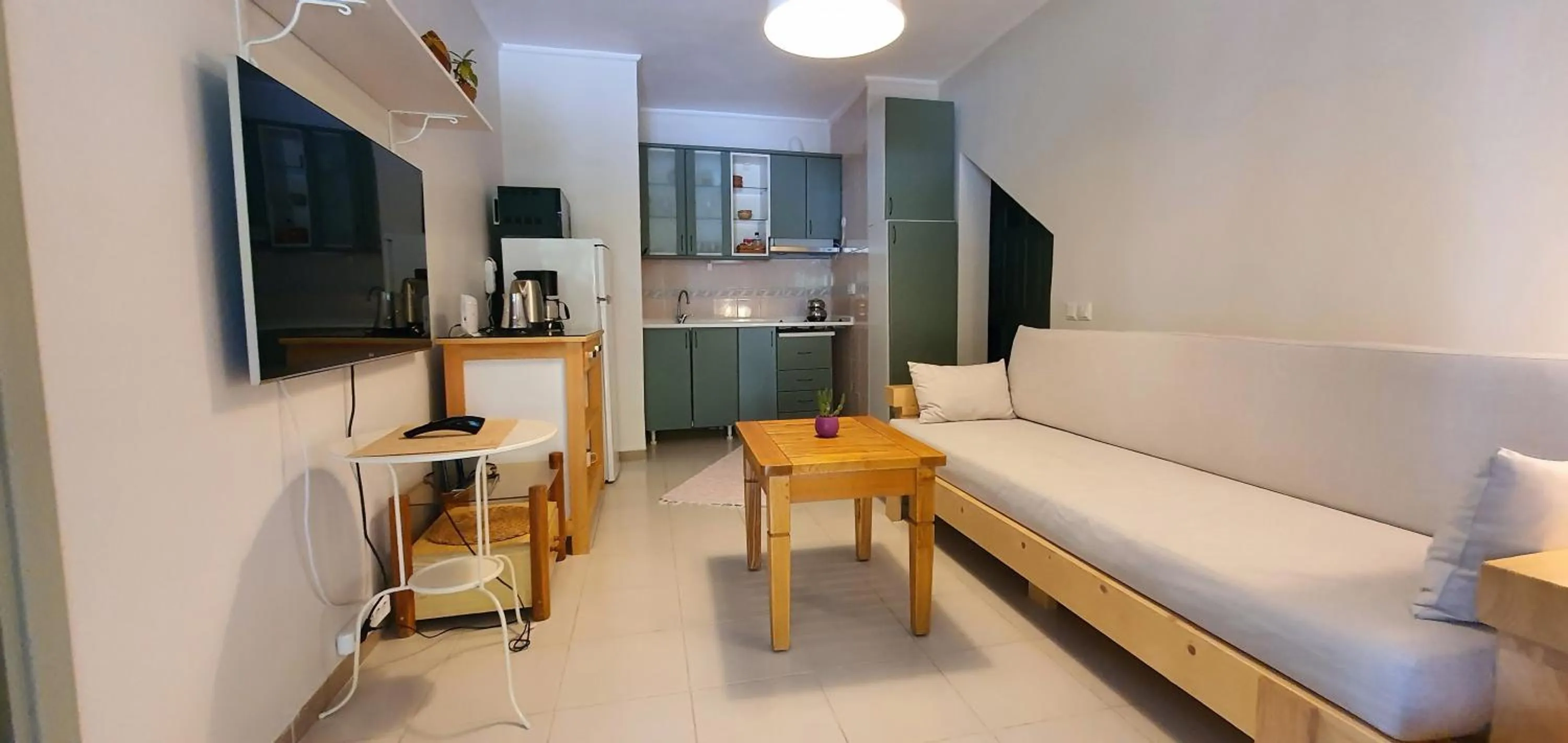 Kitchen or kitchenette in A&B Home Hotel