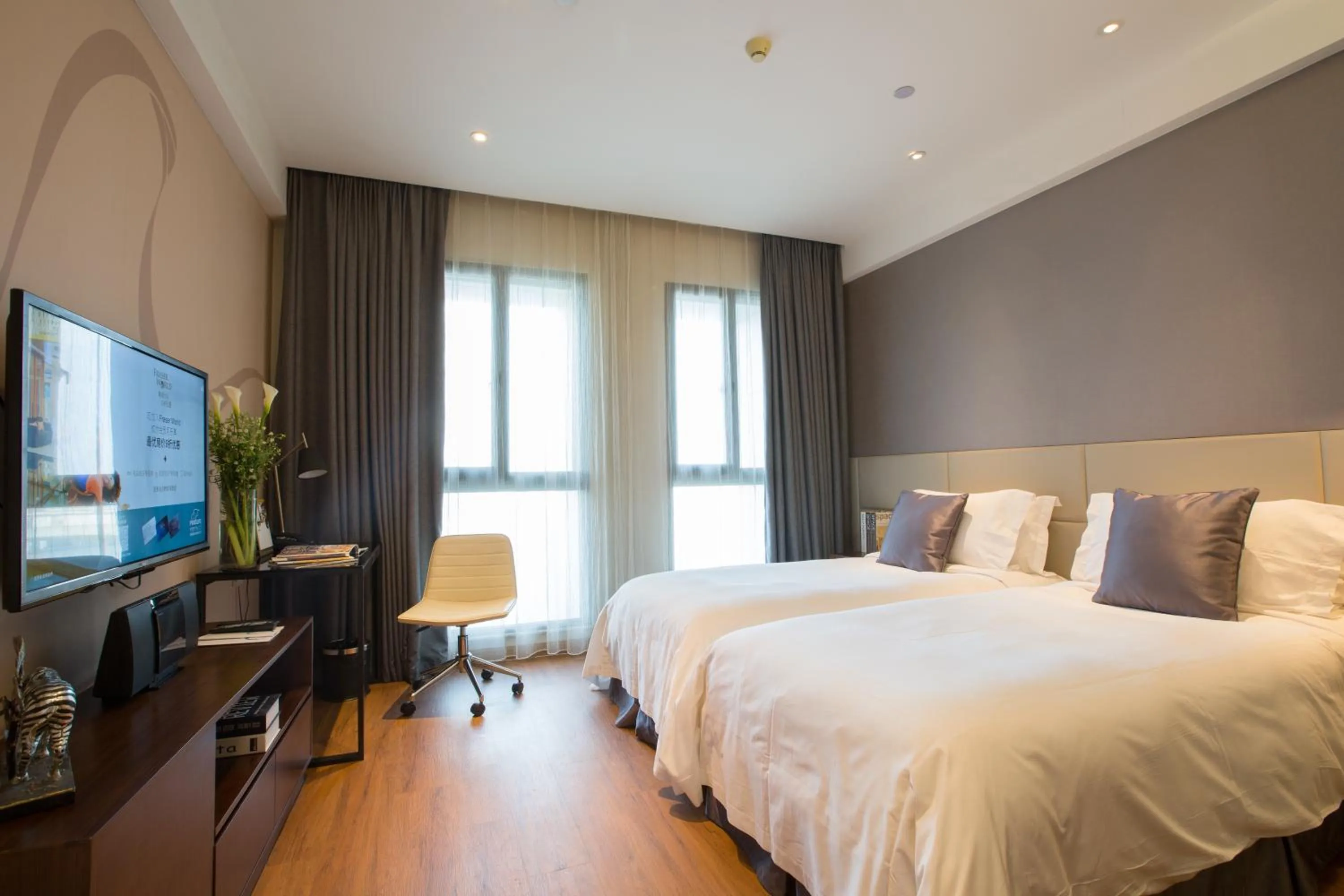 Communal lounge/ TV room, Bed in Modena By Fraser New District Wuxi