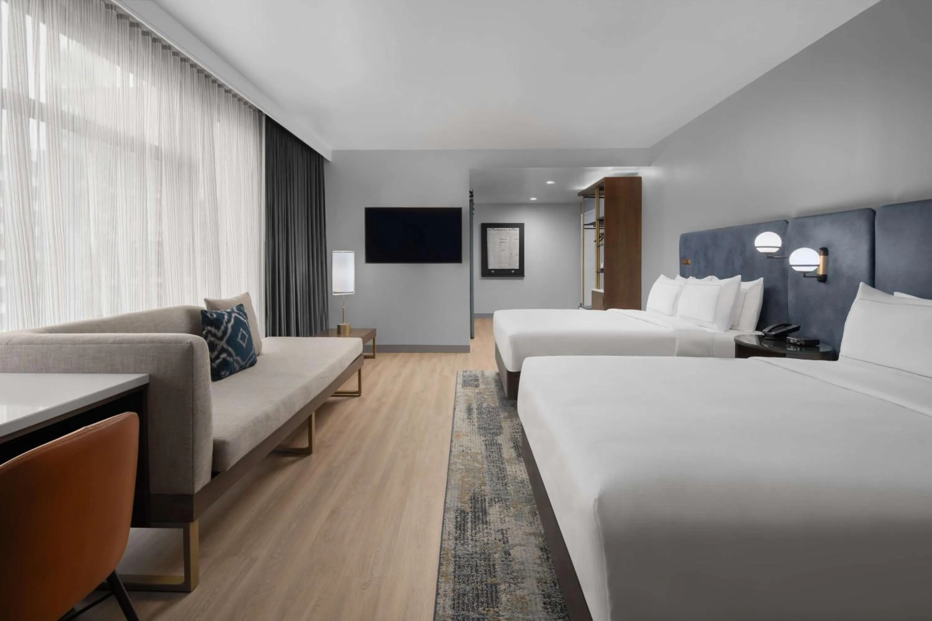 Living room, Bed in Hotel West & Main Conshohocken, Tapestry Collection Hilton