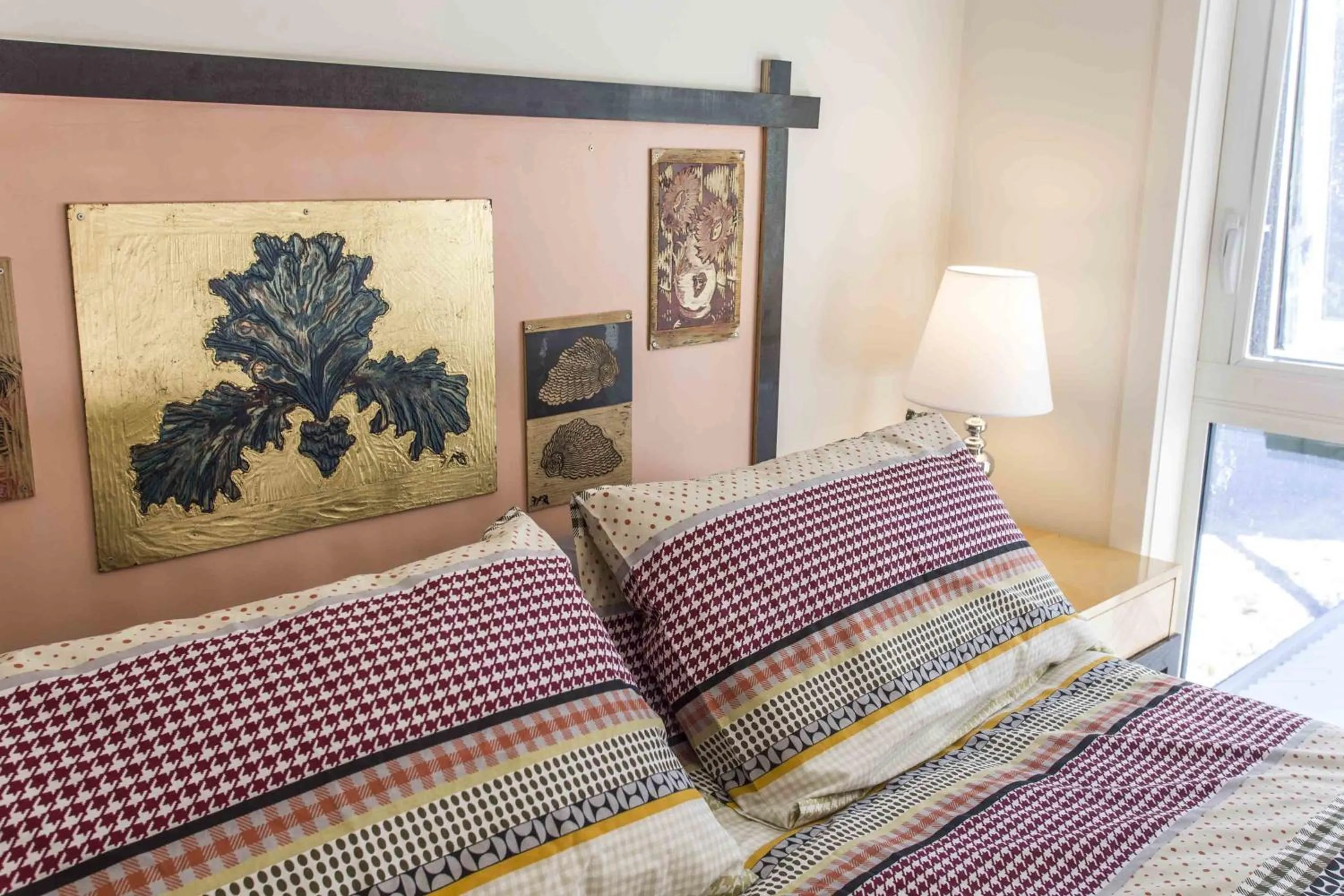 Bed in One of a Kind Apartments