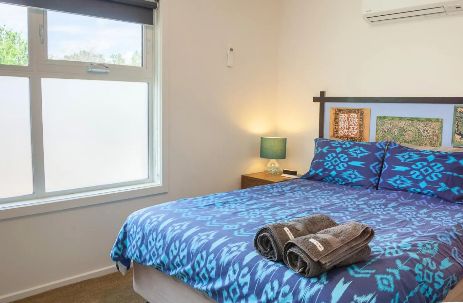 Bed in One of a Kind Apartments