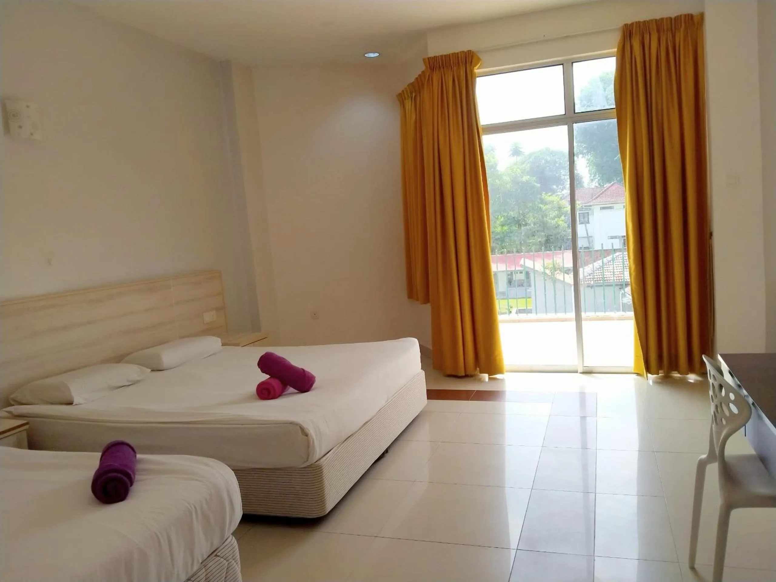 Bed in Akar Beach Resort