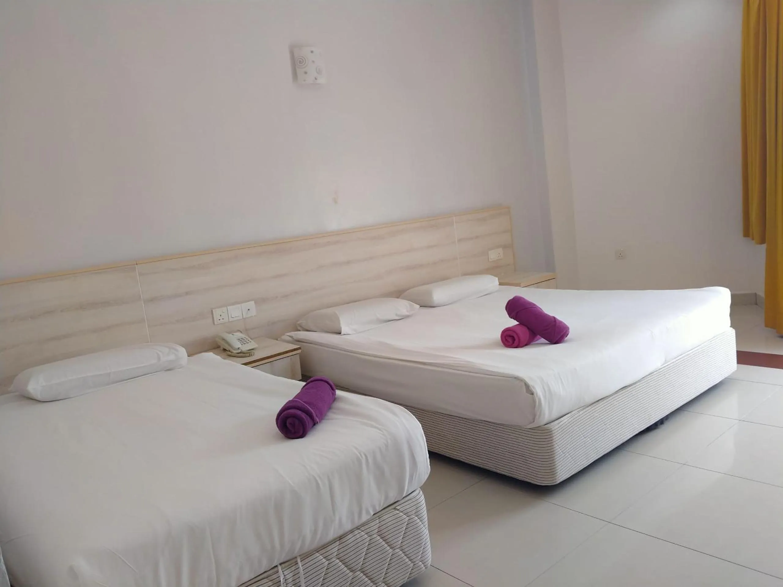 Bed in Akar Beach Resort