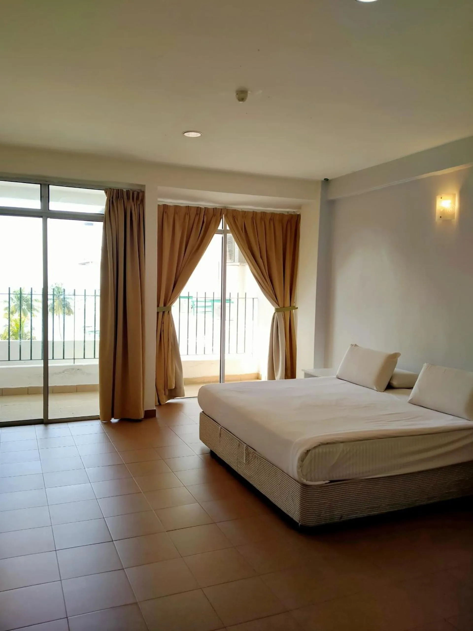 Bed in Akar Beach Resort