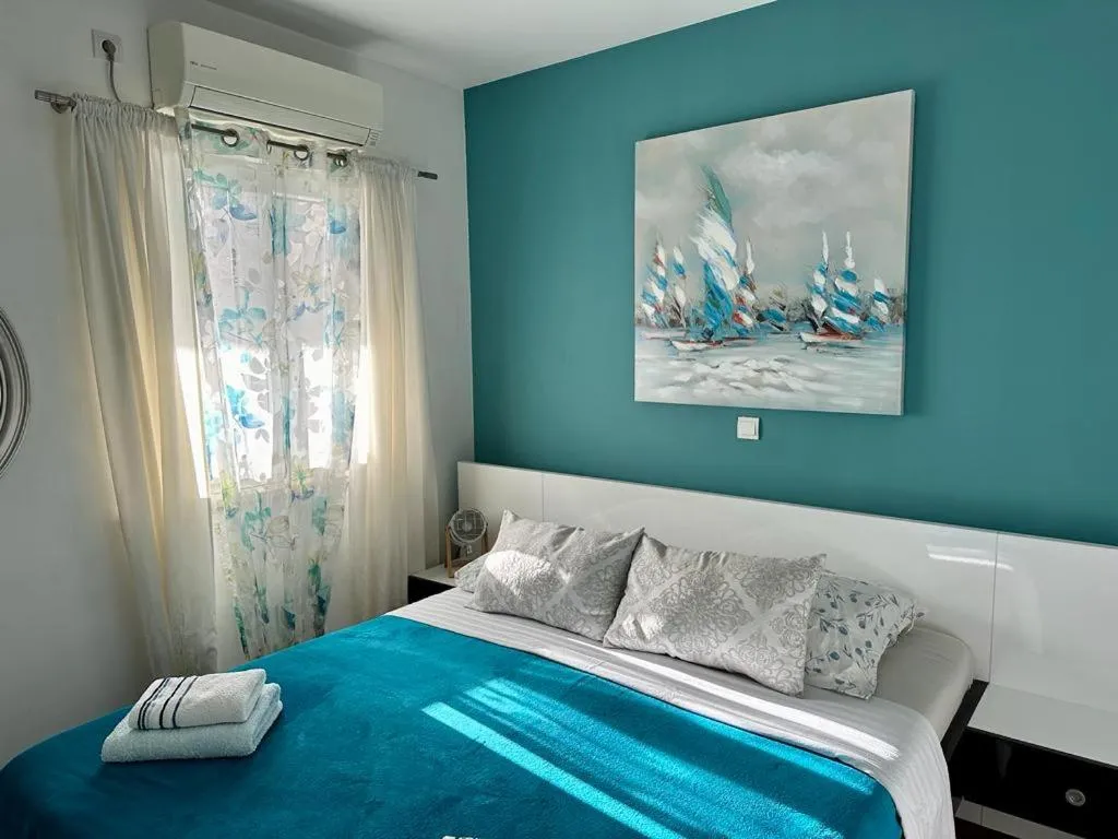 Bed in Deluxe Suites Mandić