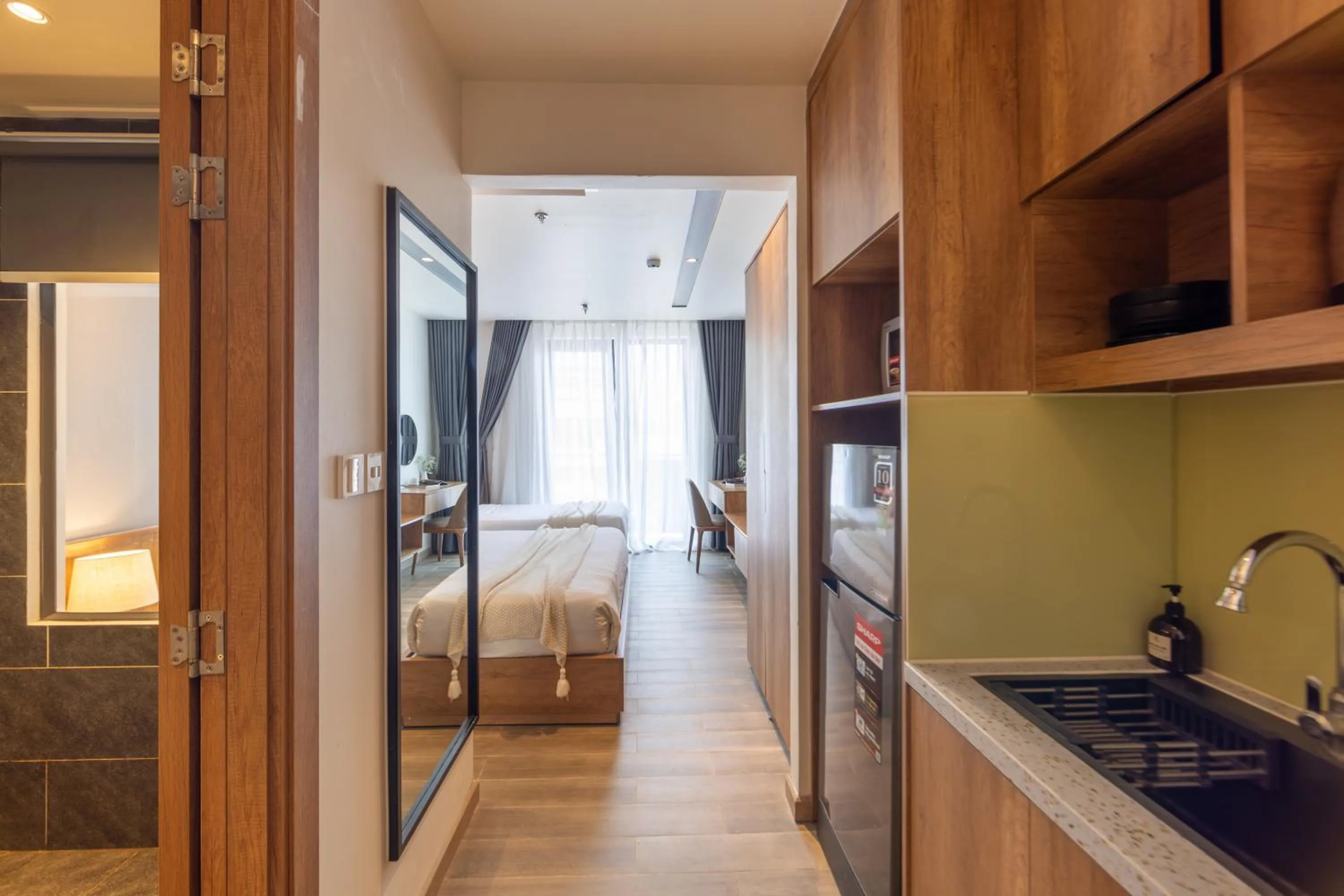 Bed in TTR Central Apart Hotel