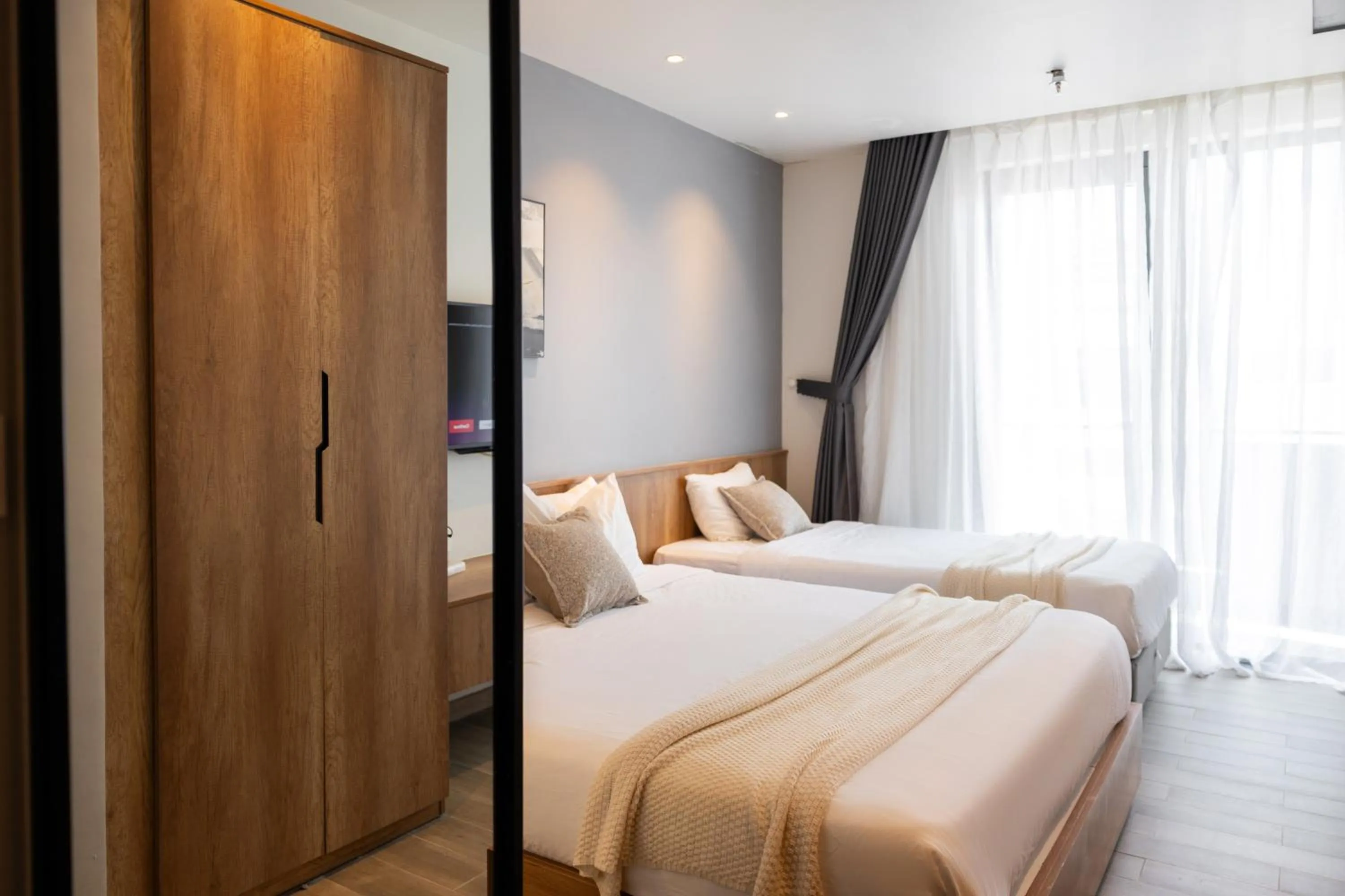 Bed in TTR Central Apart Hotel