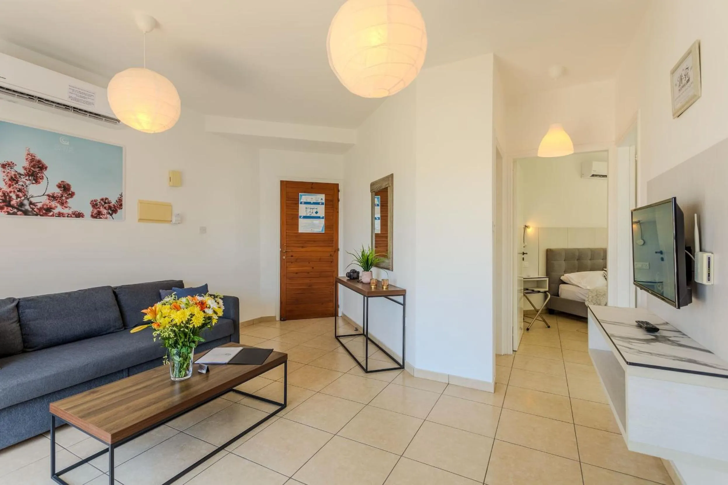 Living room, Bed in Artemis Cynthia Complex