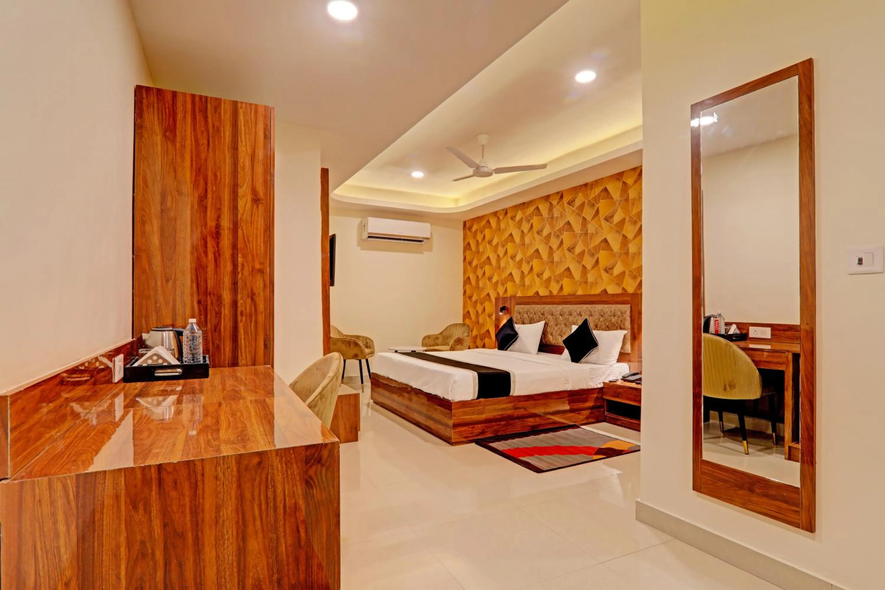 Bed in Hotel Heera Grand