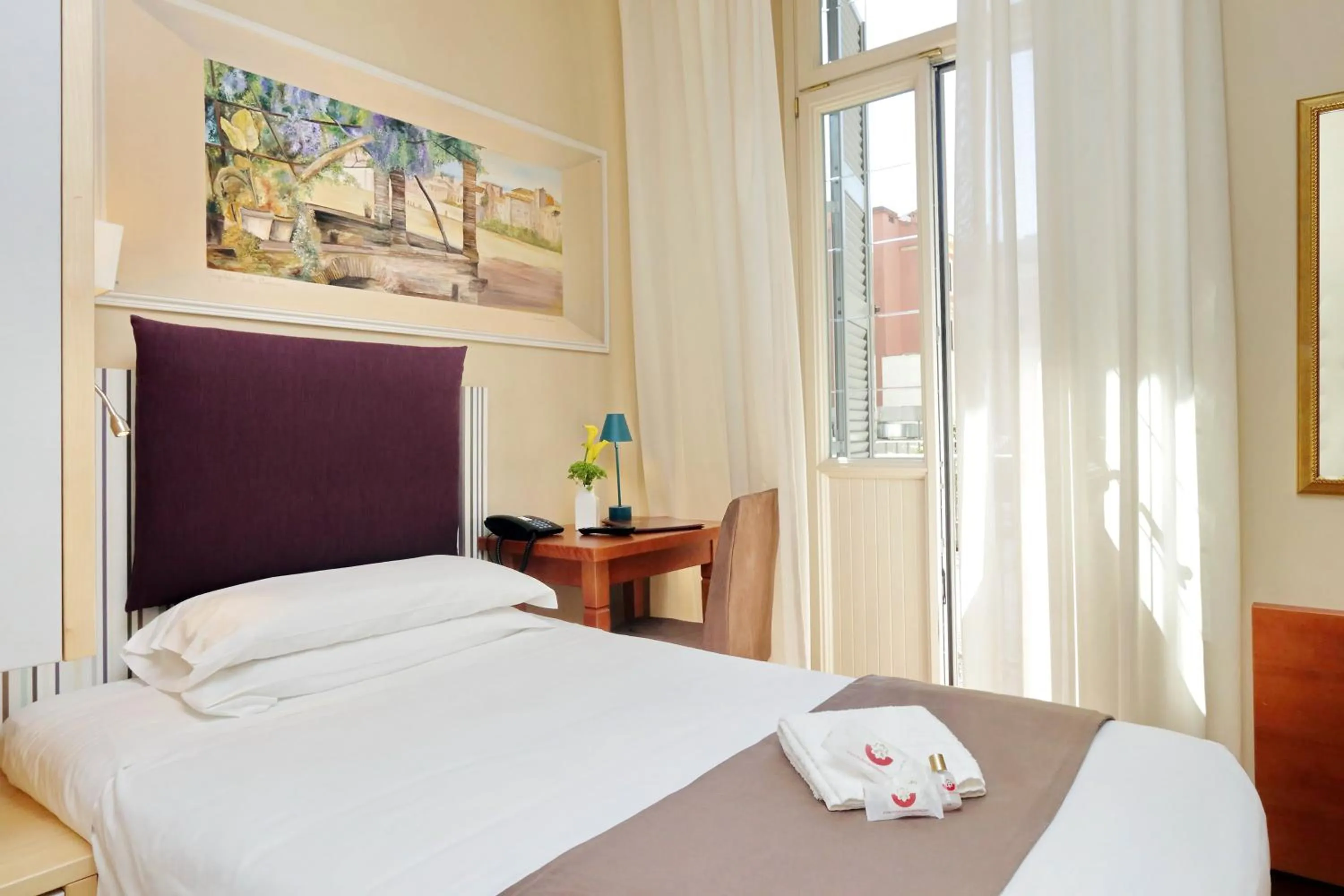 Bed in Hotel Camelia