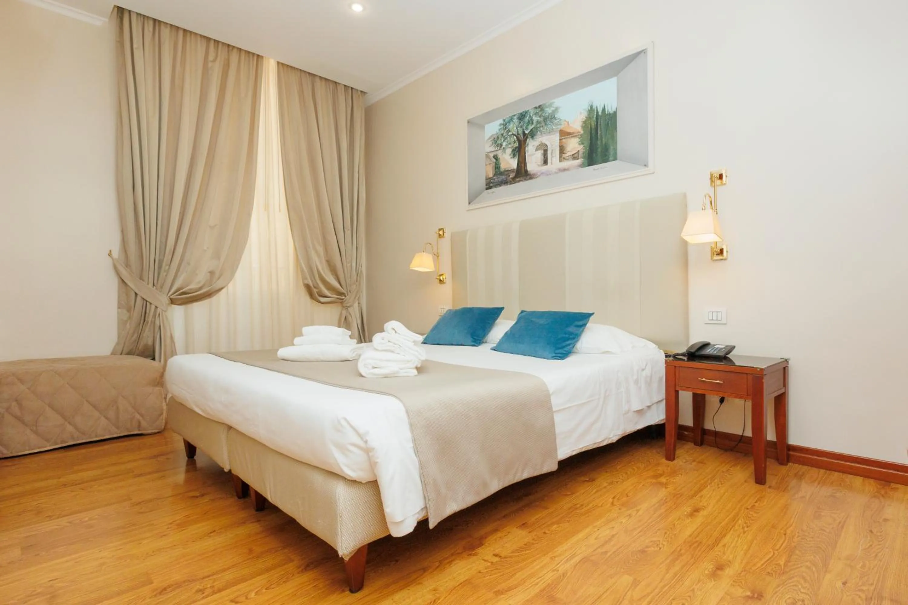 Bed in Hotel Camelia