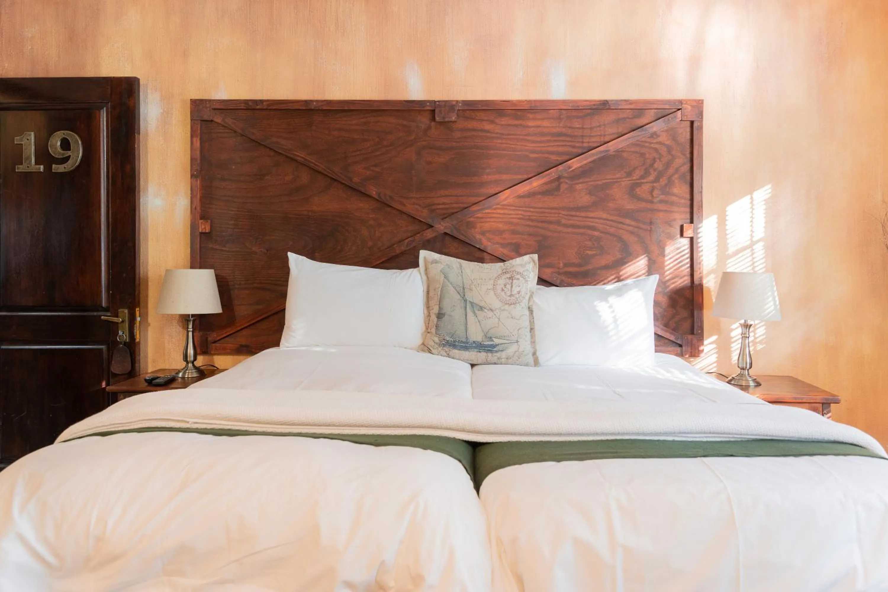 Bedroom in Hotel Nomad Belvedere Lodge