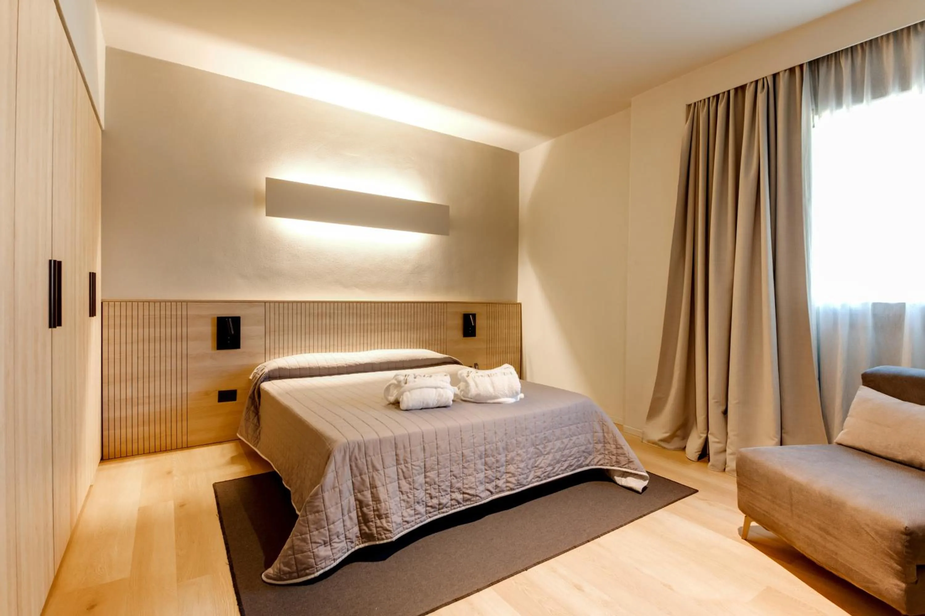 Bed in Mima Aparthotel Boutique & Spa