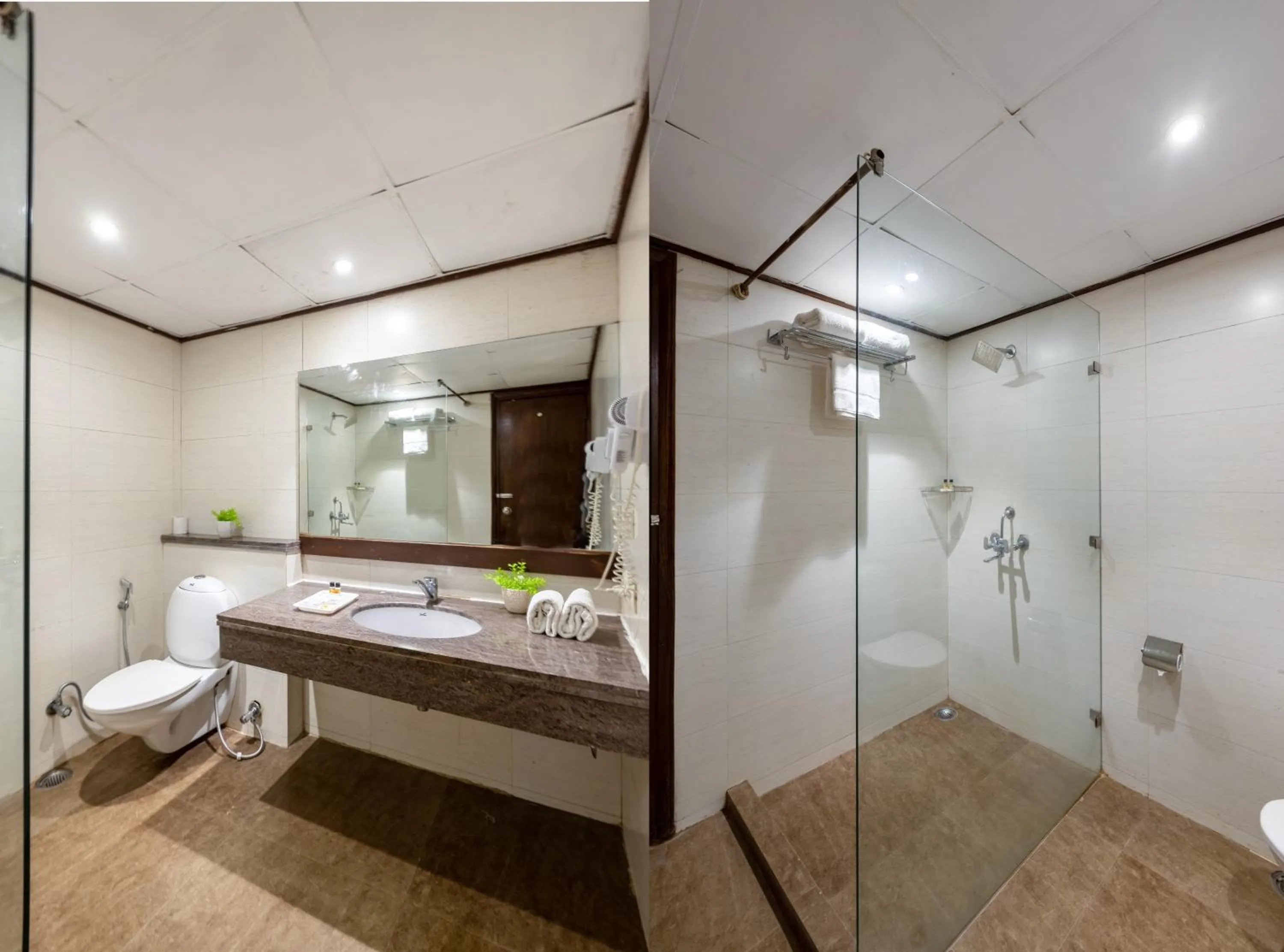 Shower in Hotel Arch Plaza at Yashobhoomi By Arch Group