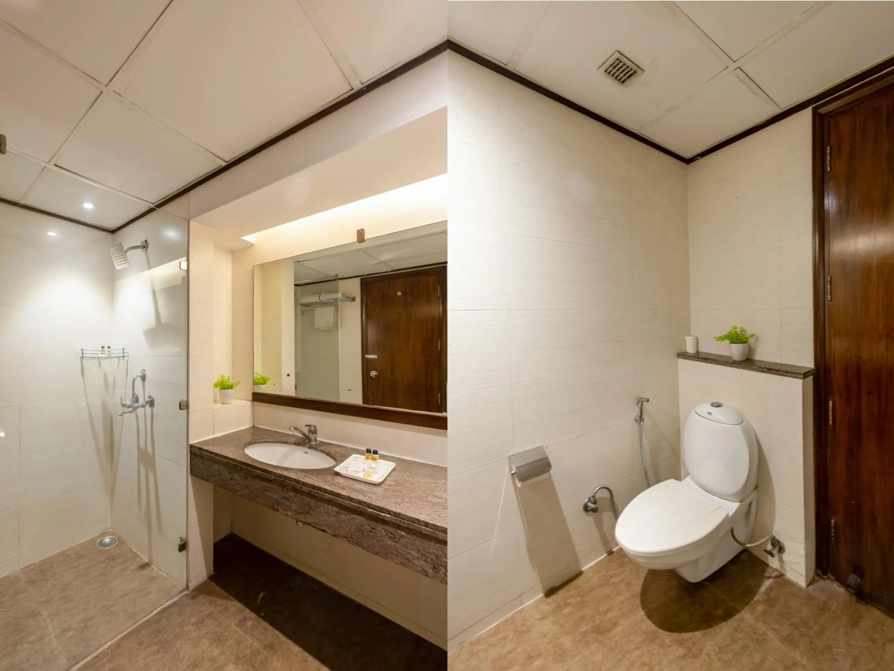 Shower in Hotel Arch Plaza at Yashobhoomi By Arch Group