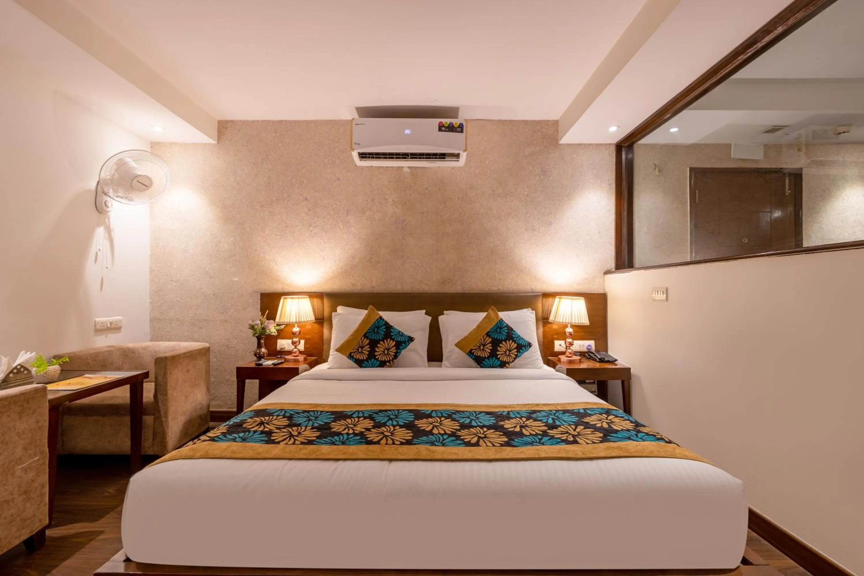 Bed in Hotel Arch Plaza at Yashobhoomi By Arch Group
