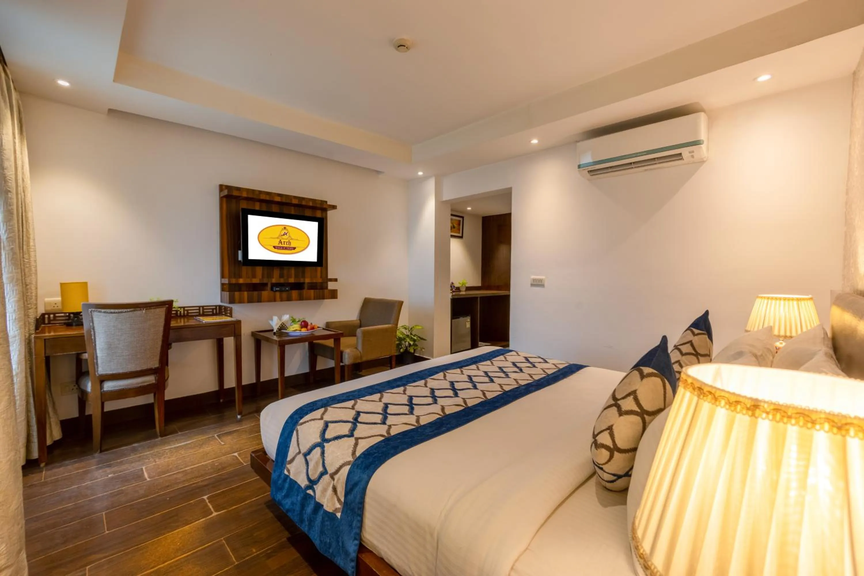 Bed in Hotel Arch Plaza at Yashobhoomi By Arch Group