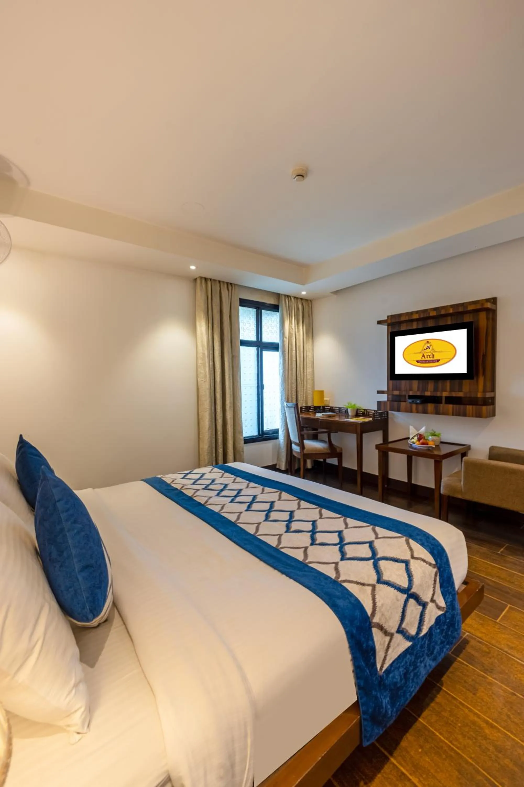 Bed in Hotel Arch Plaza at Yashobhoomi By Arch Group