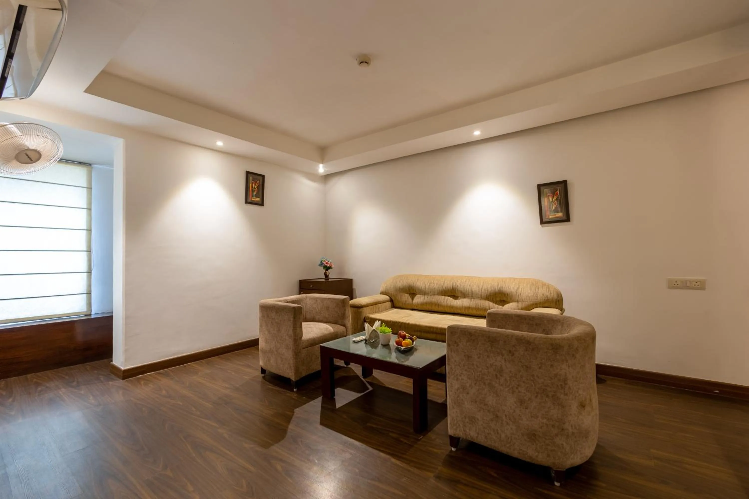 Seating area in Hotel Arch Plaza at Yashobhoomi By Arch Group