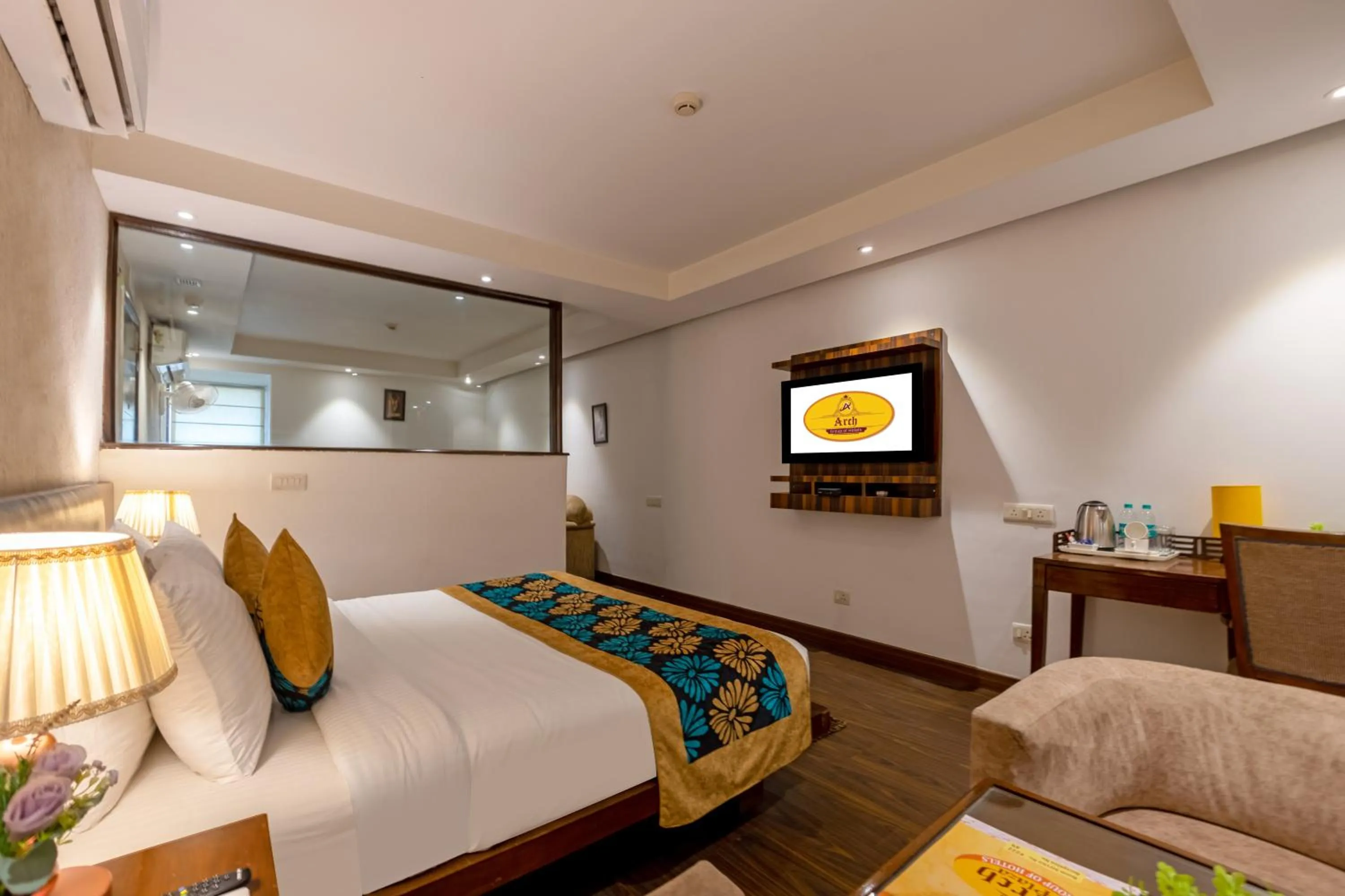 Bed in Hotel Arch Plaza at Yashobhoomi By Arch Group