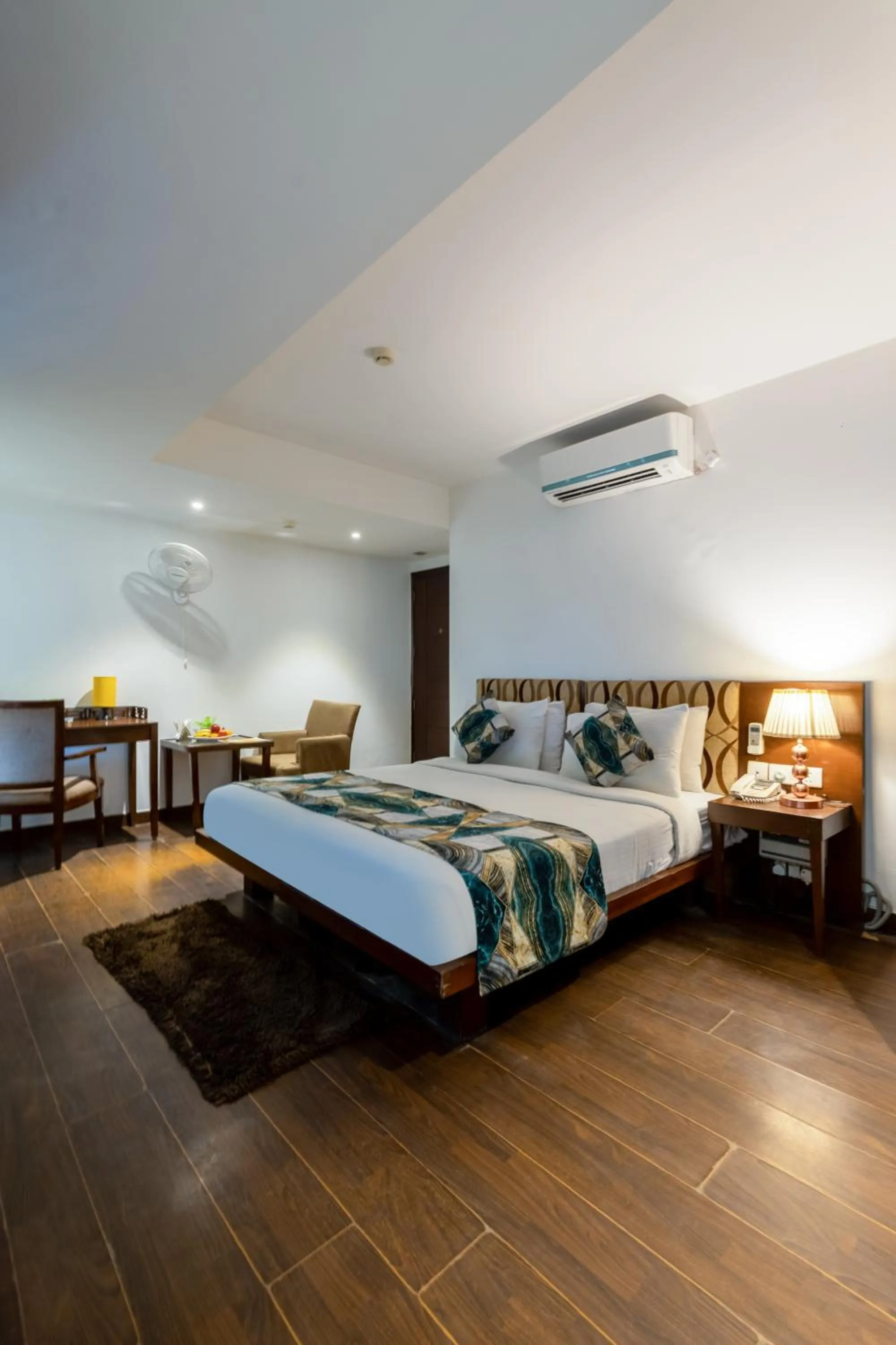 Bed in Hotel Arch Plaza at Yashobhoomi By Arch Group