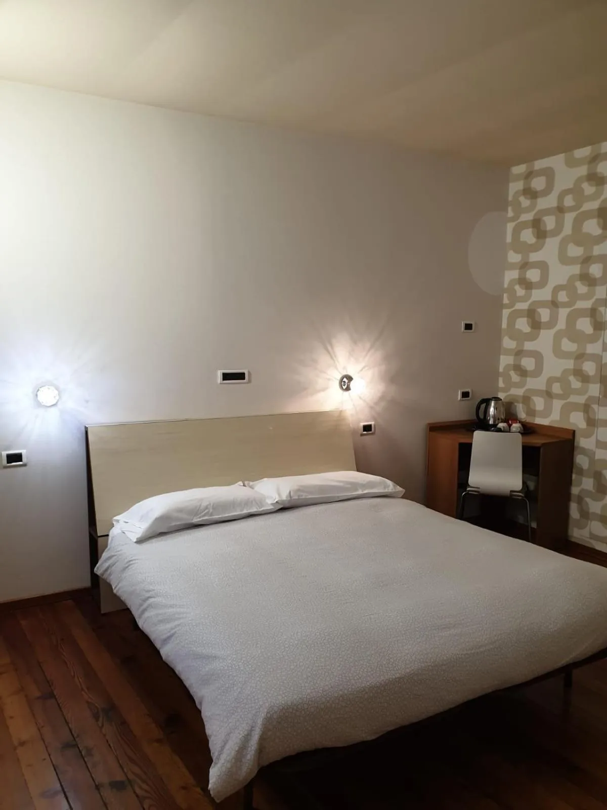 Bed in Piccolo Hotel Olina