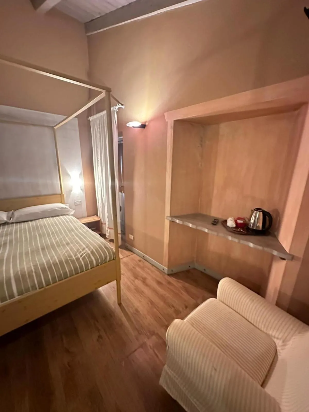 Bed in Piccolo Hotel Olina