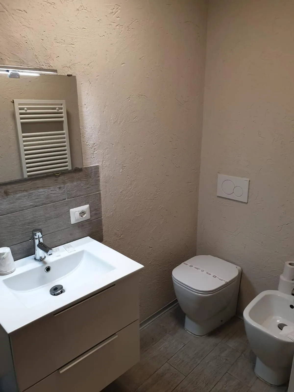 Toilet in Piccolo Hotel Olina