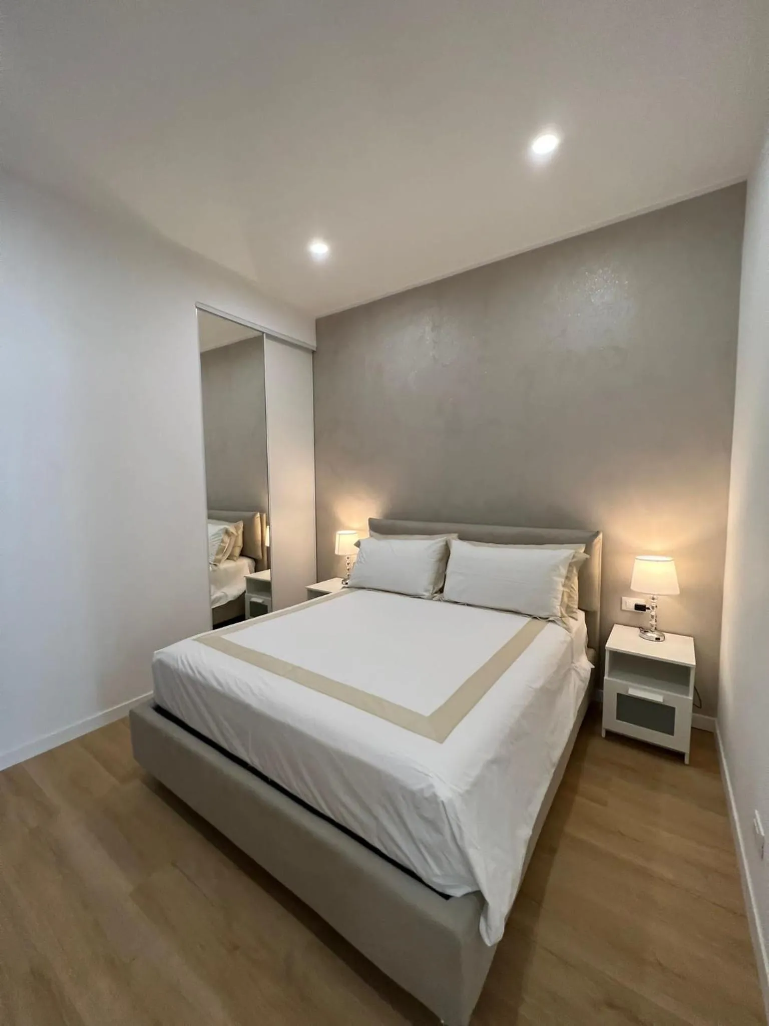 Bed in Blu Apartment