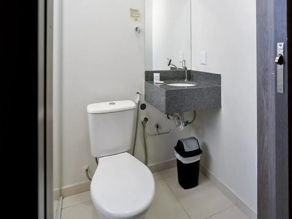 Toilet in Hotel Valerim Itajaí / Navegantes
