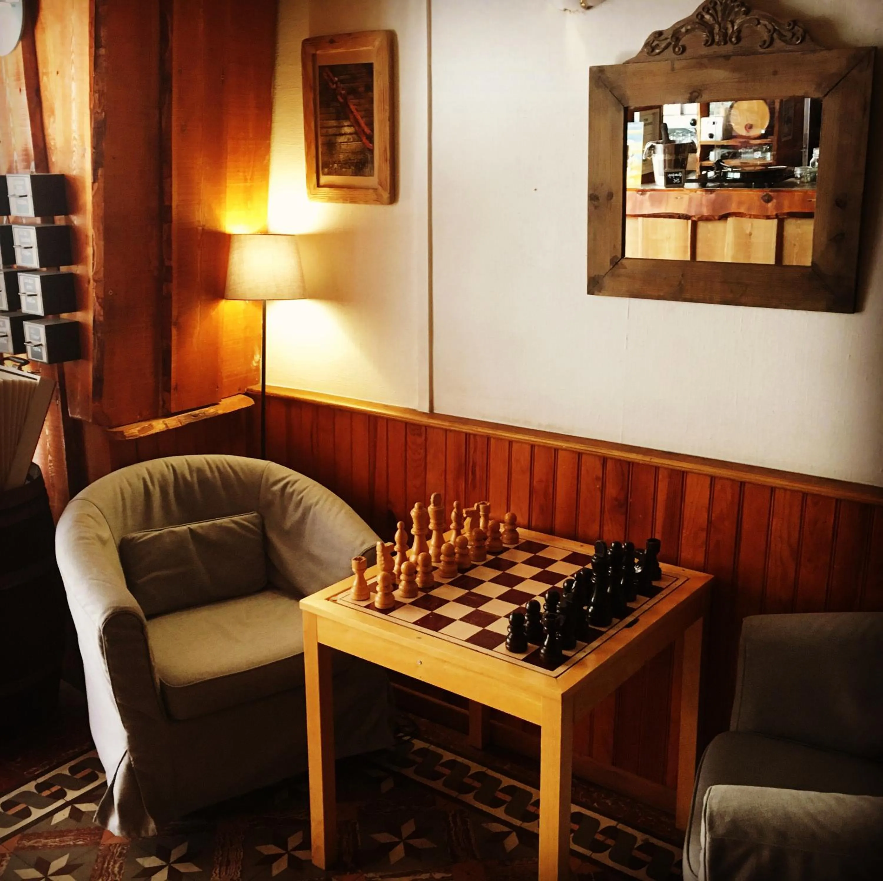 Communal lounge/ TV room in Hotel Au Bon Accueil