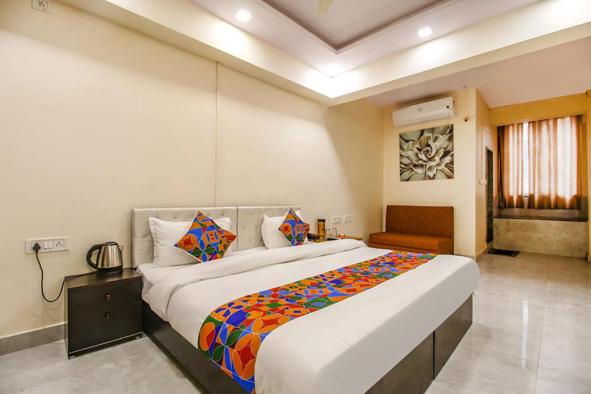 Bed in FabHotel Sanskar